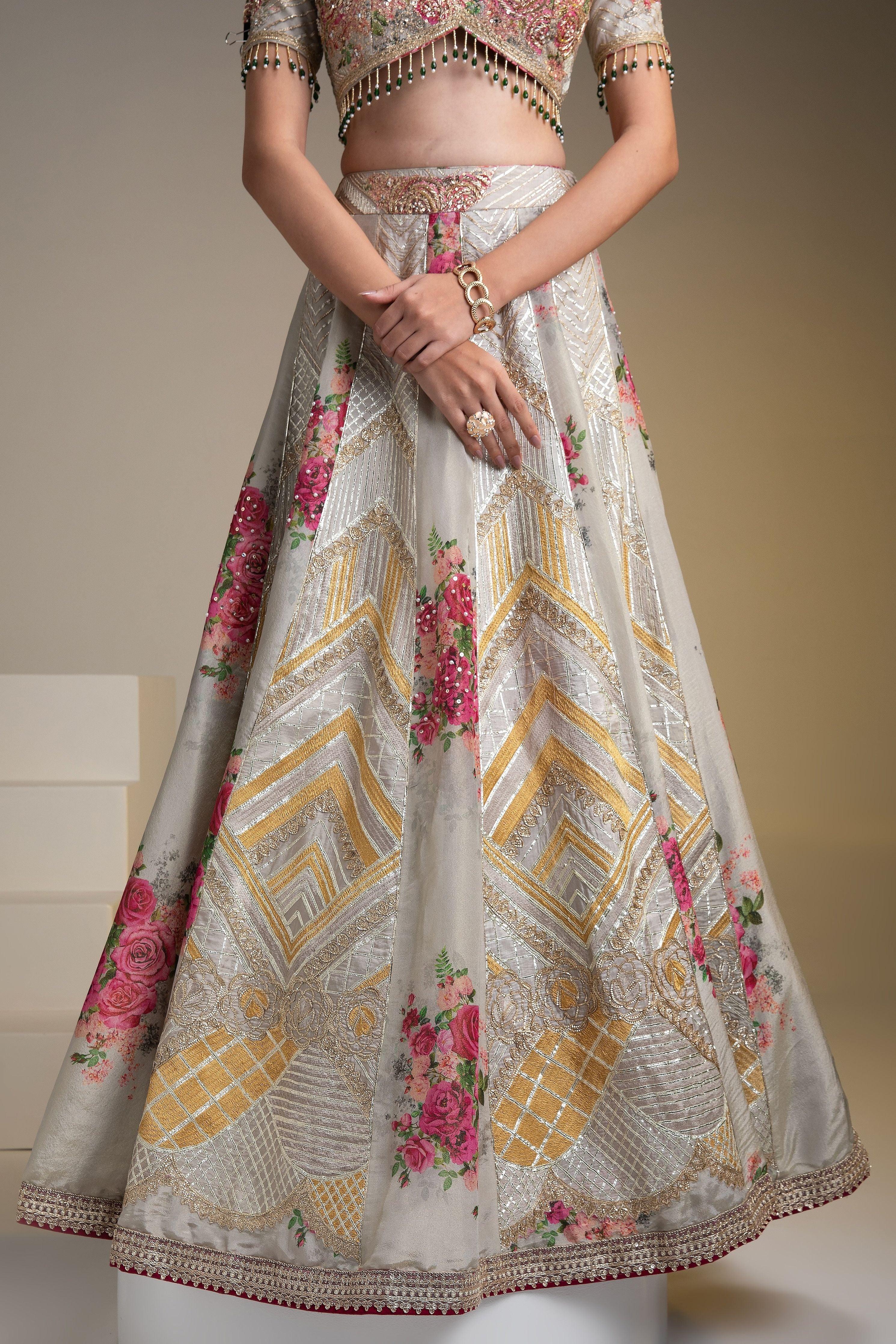 Opulent Silver Tissue Lehenga Set with Vibrant Floral Print and Zari Work - Mokshaa