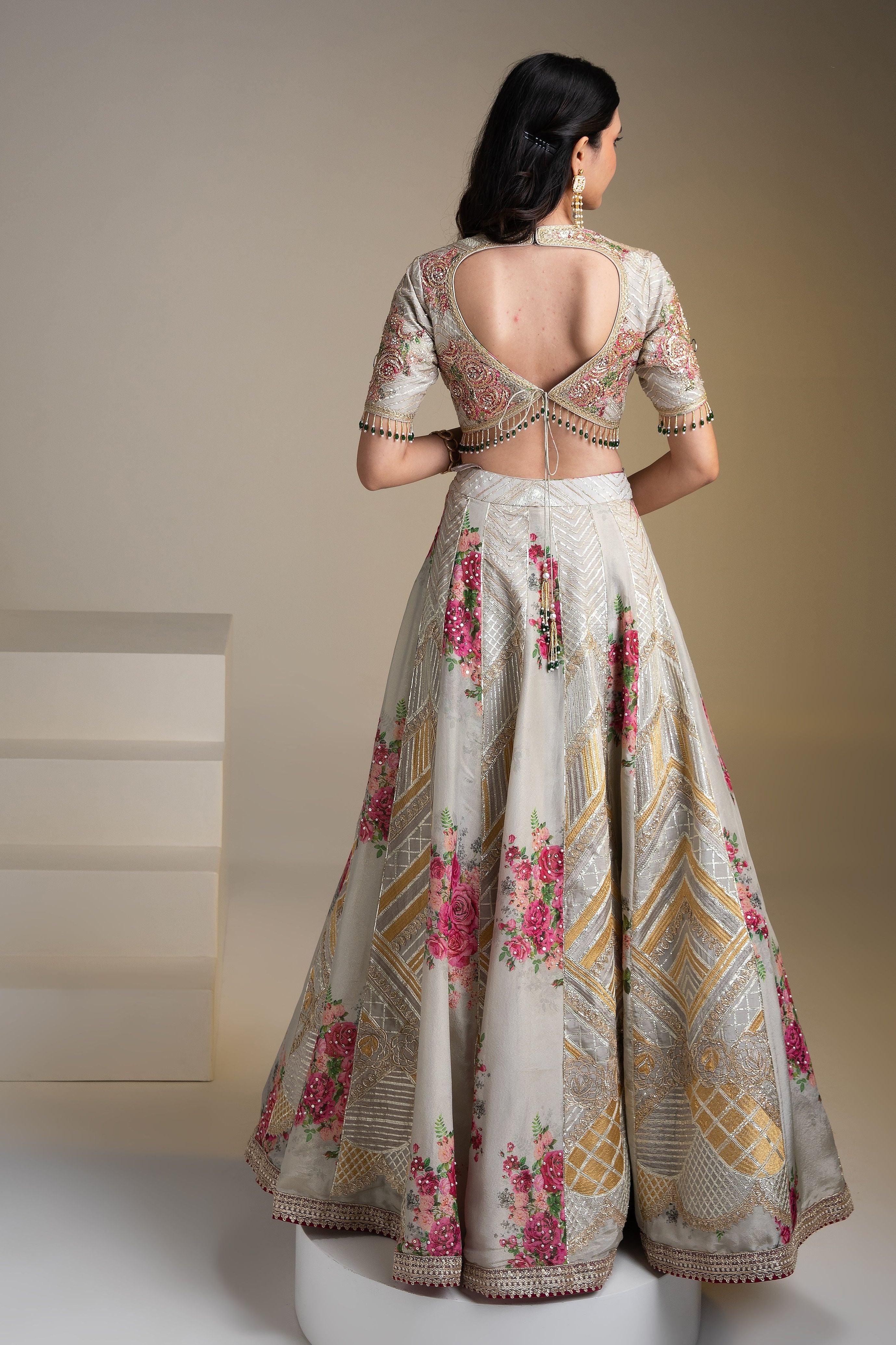 Opulent Silver Tissue Lehenga Set with Vibrant Floral Print and Zari Work - Mokshaa