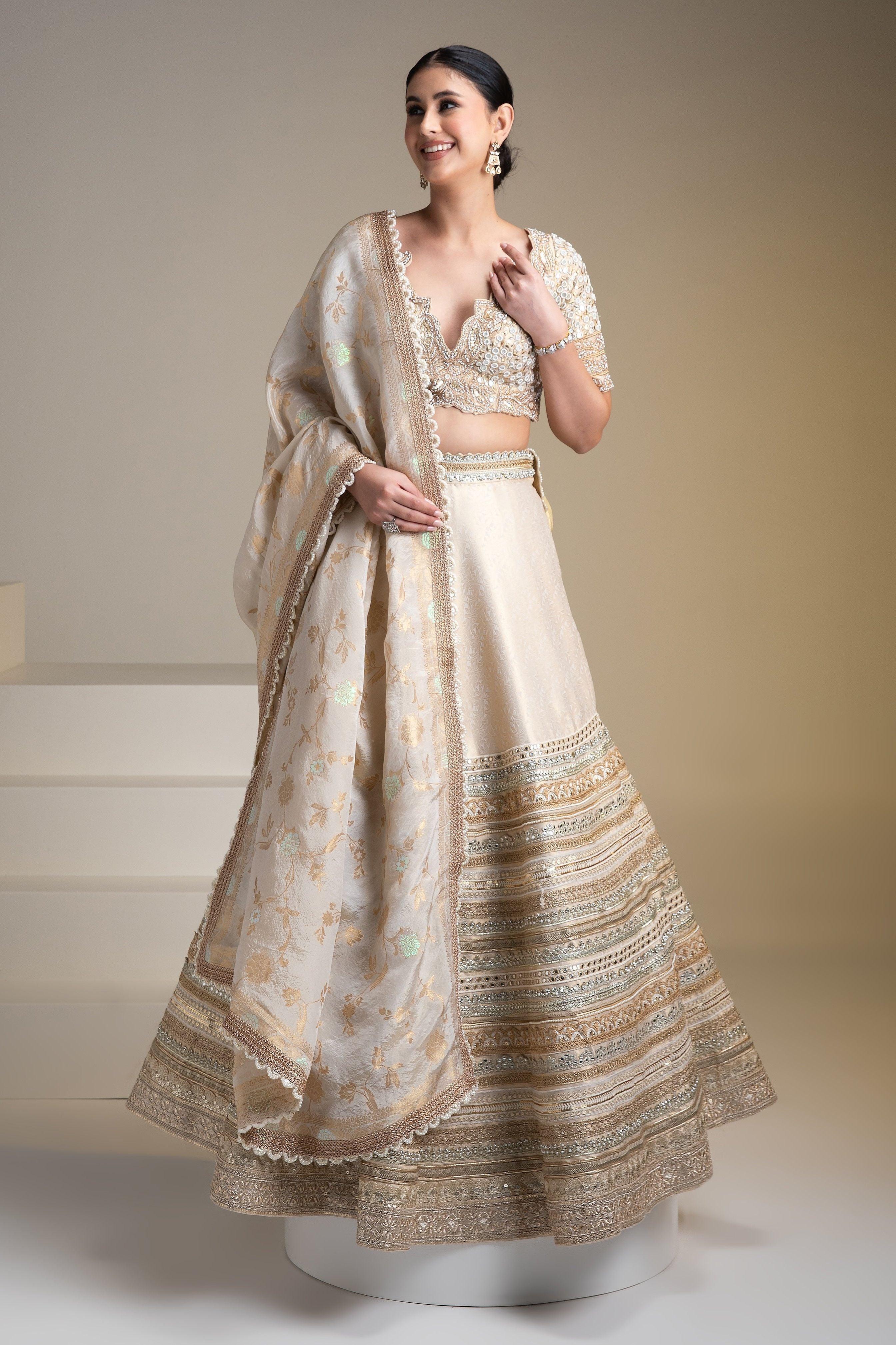 Ivory Banarasi Silk Lehenga Set with Zari and Mirror Detailing - Mokshaa