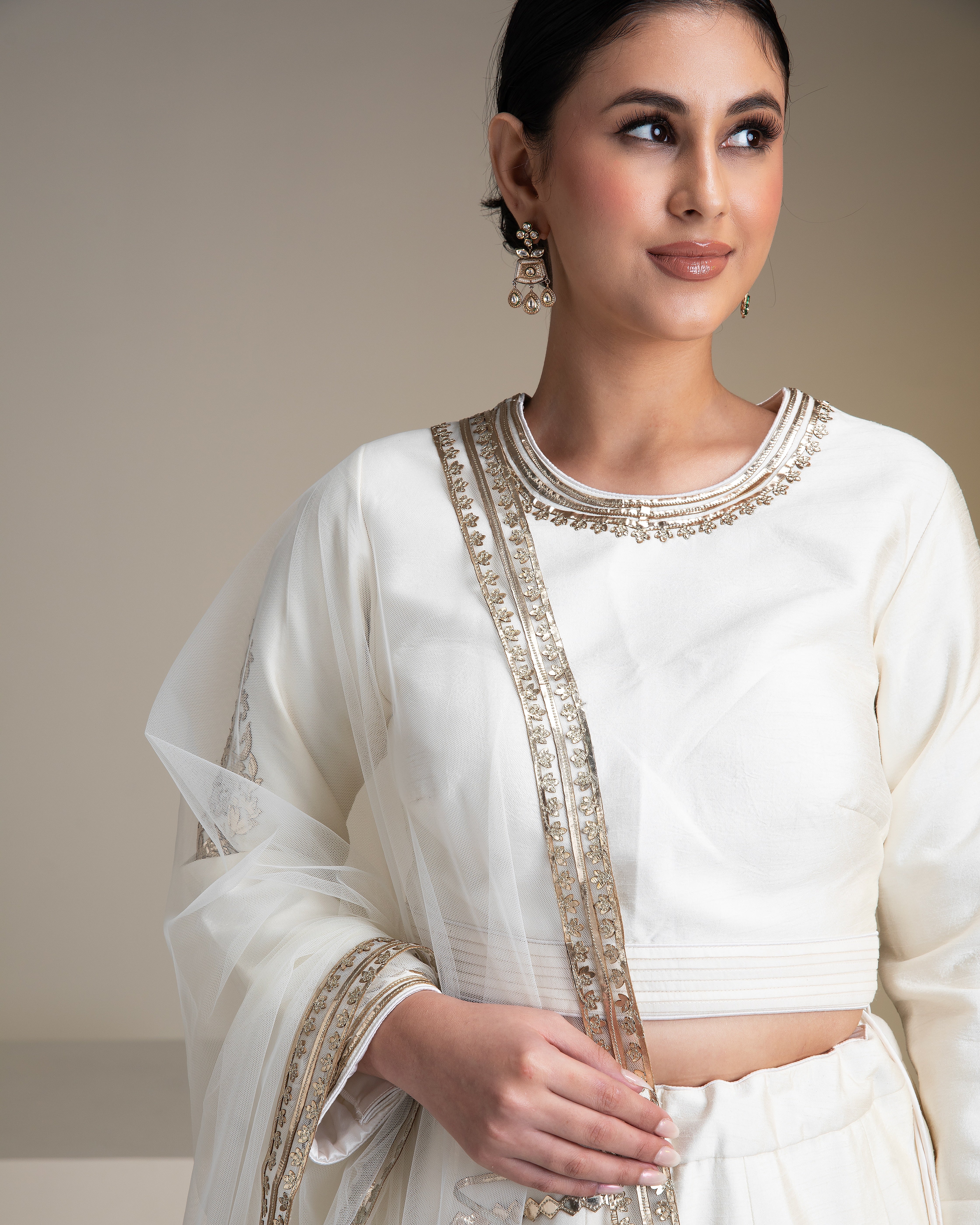 Pristine White Silk Lehenga Set with Metallic Gold Embroidery - Mokshaa