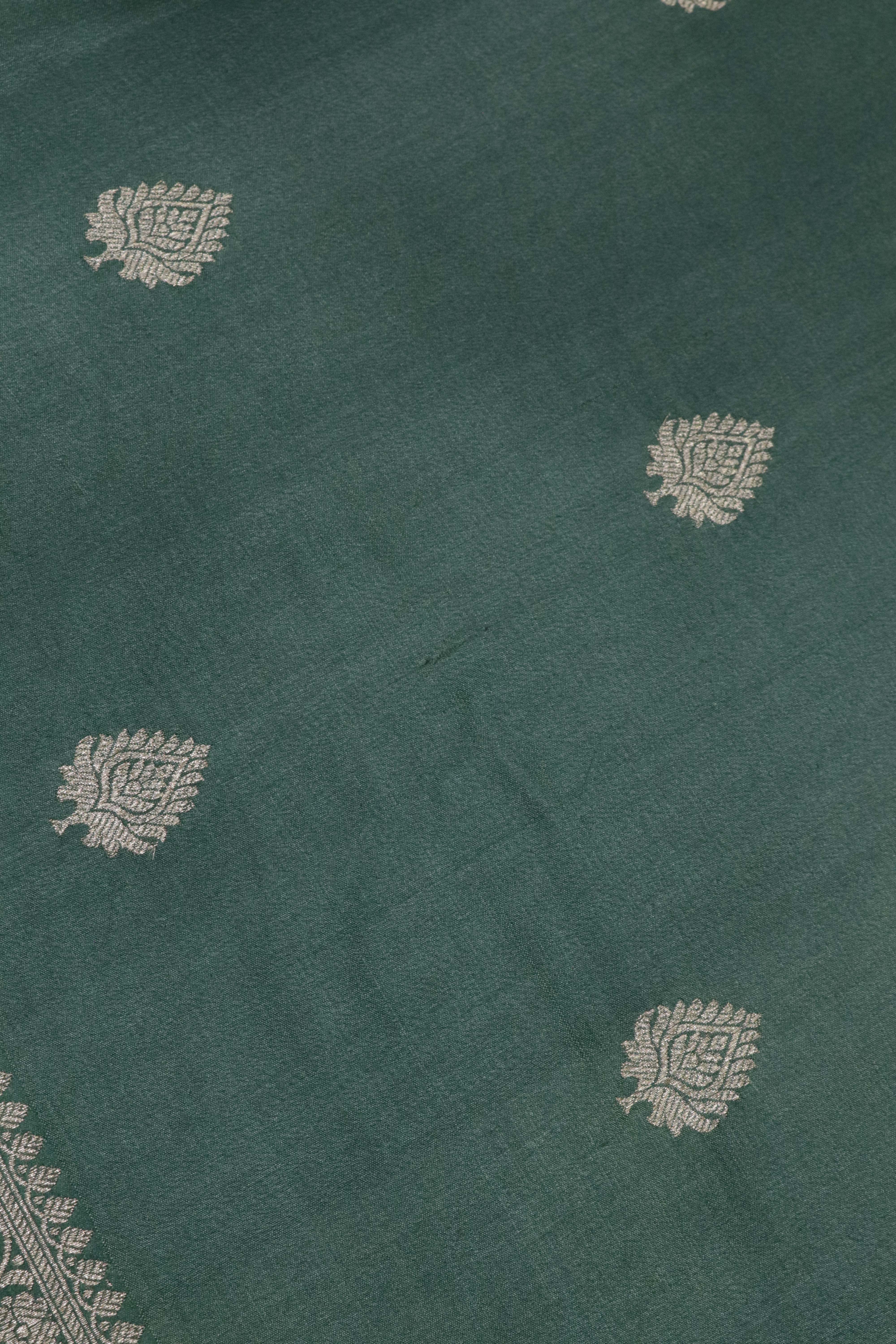 Turf Green Tussar Silk Saree with Silver Zari Motifs & Printed Border
