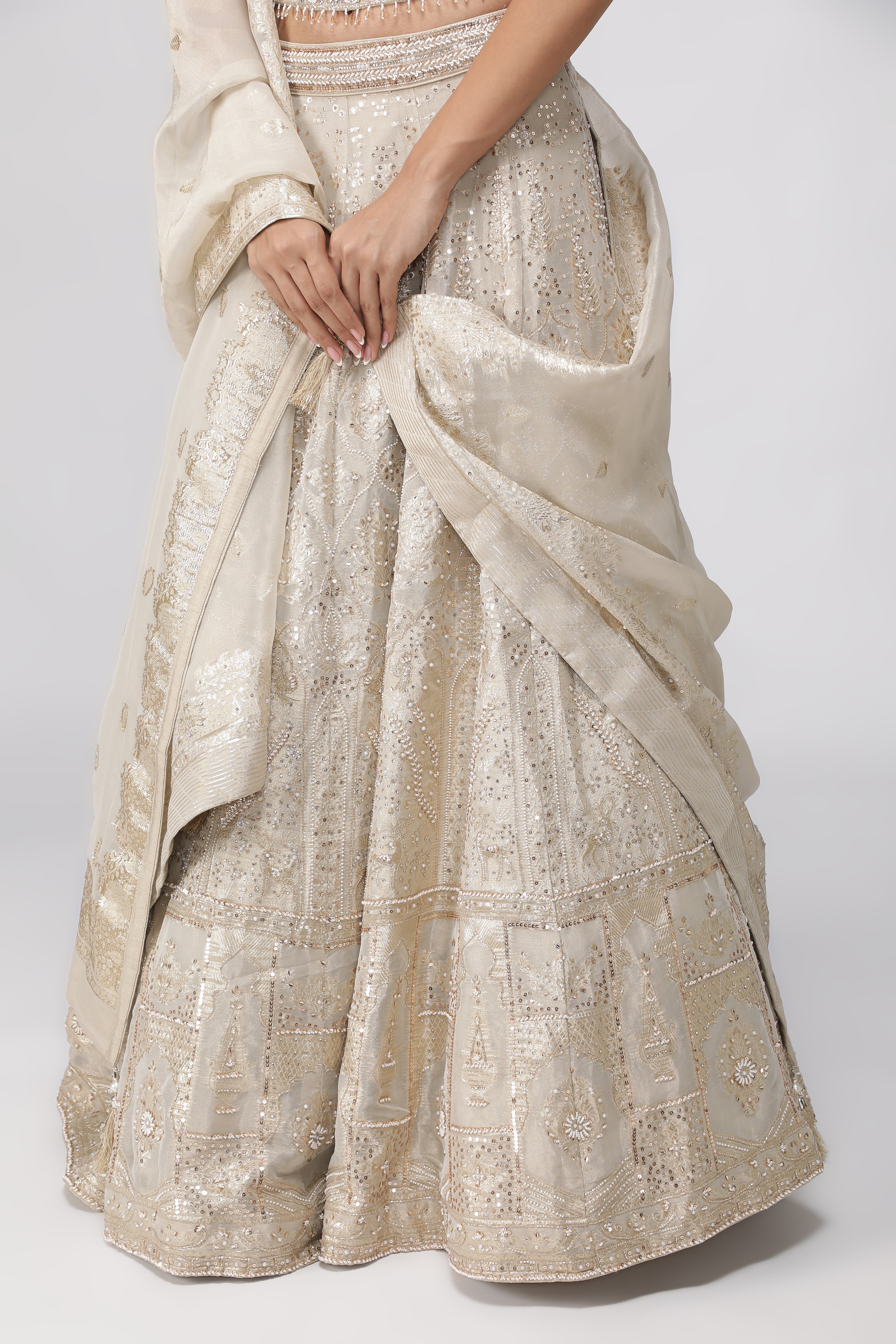 Ivory Banarasi Tissue Lehenga with Pearl Embellished Corset Blouse