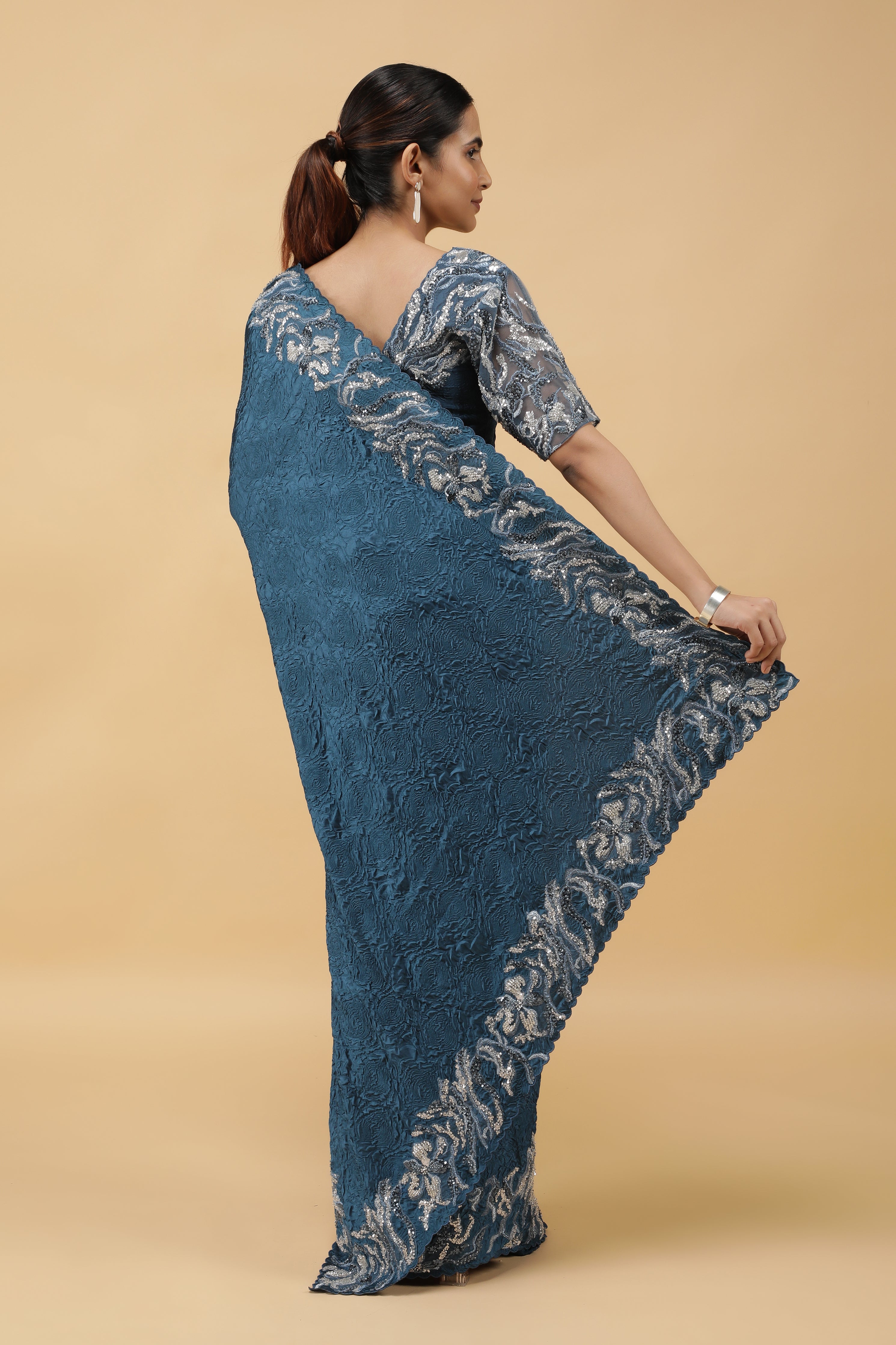 Teal Blue Crepe Silk Saree with Beaded Border