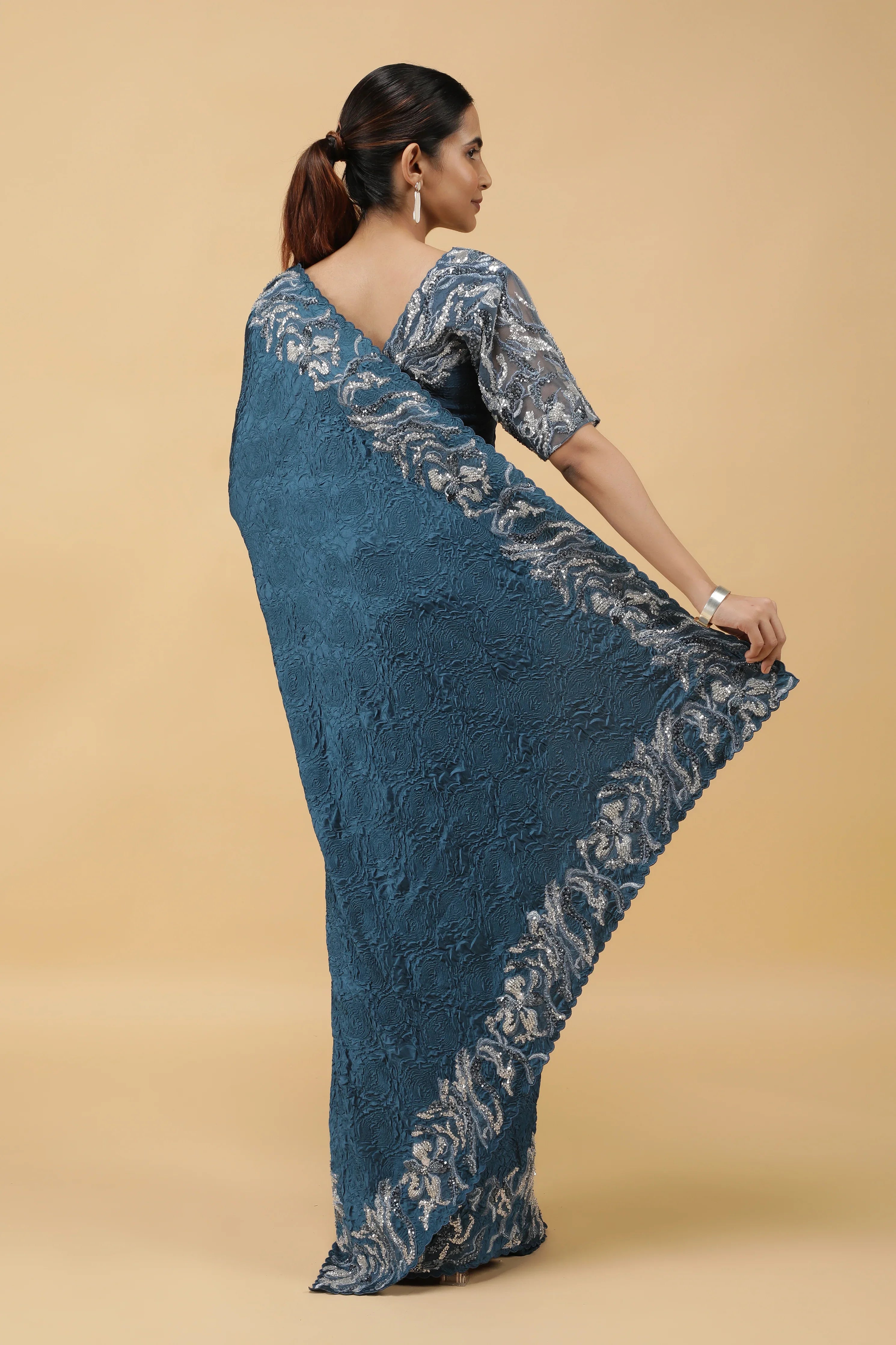 Teal Blue Crepe Silk Saree with Beaded Border - Mokshaa