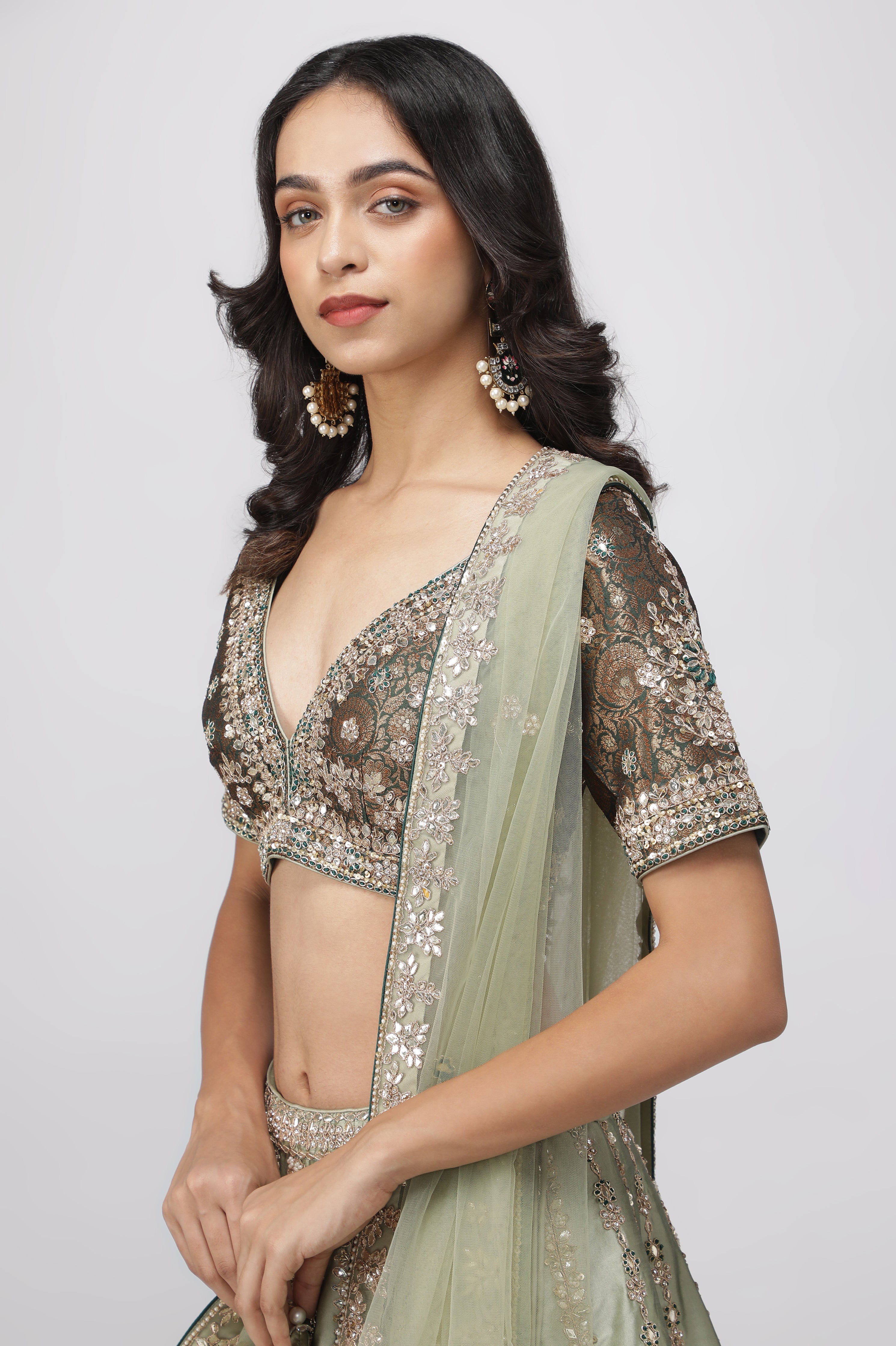 Mint Green Silk Lehenga with Bottle Green Banarasi Blouse