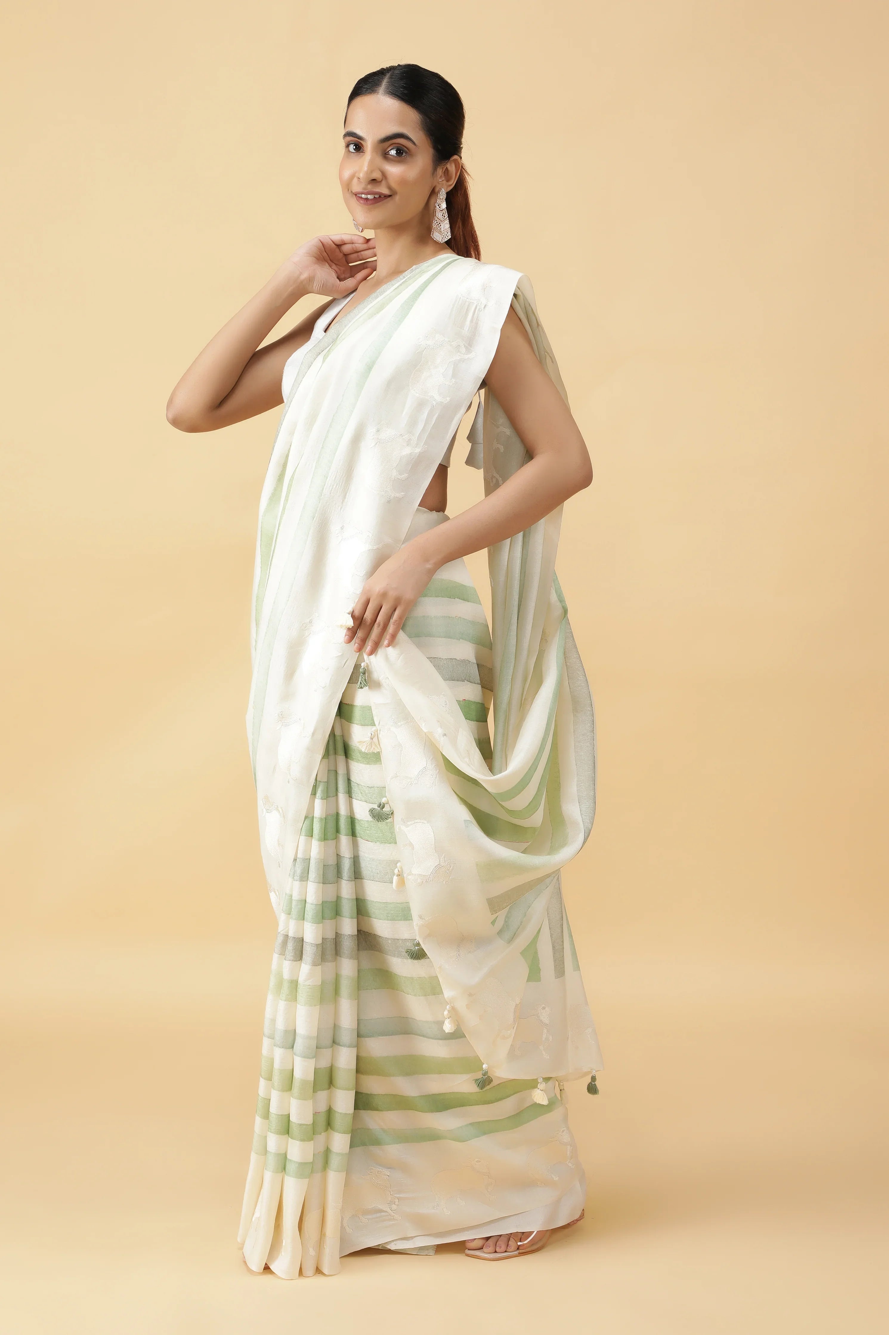 Green & Off White Tussar Silk Saree with Animal Motifs | Mokshaa