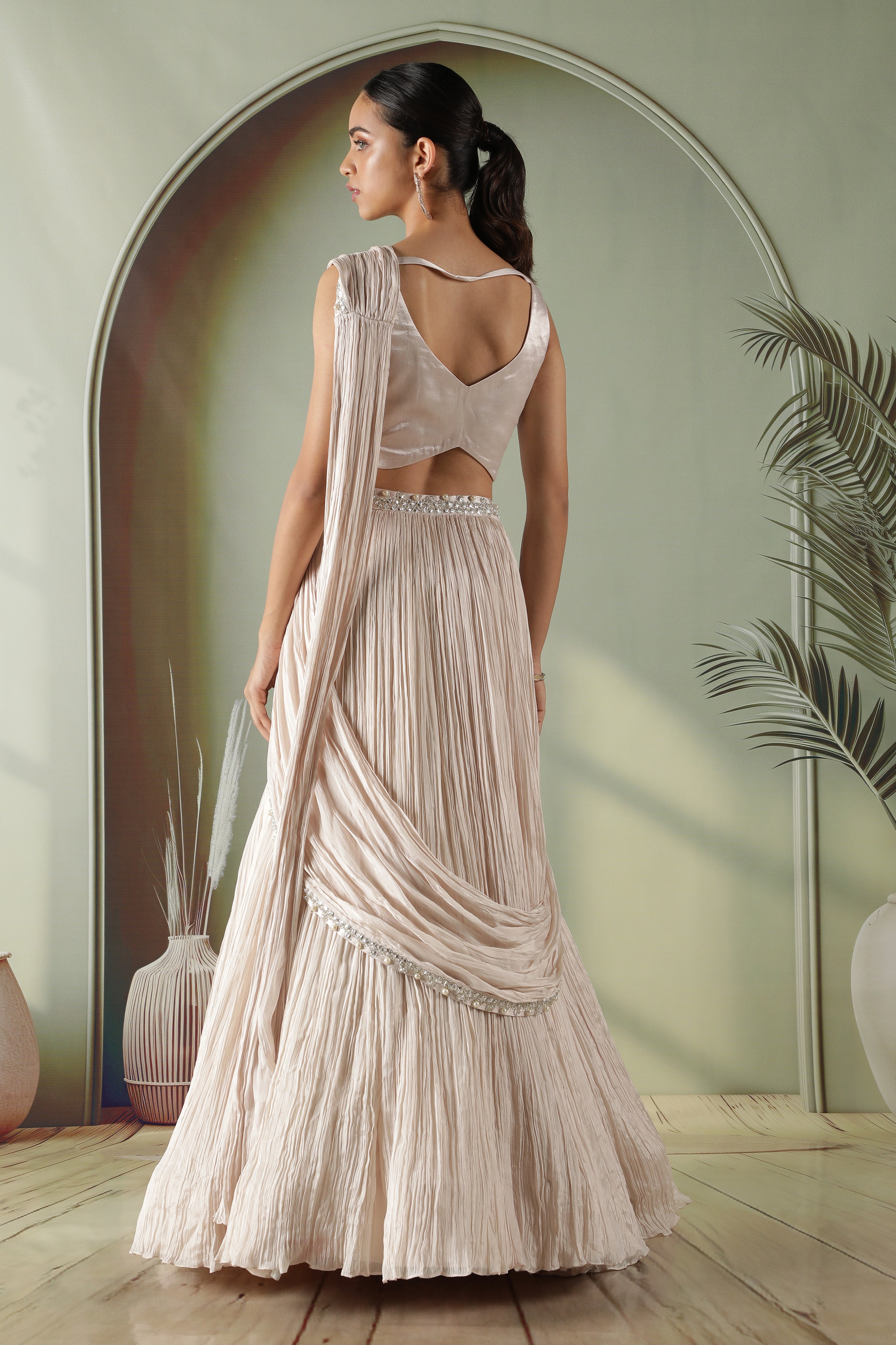 Ivory Silk Lehenga with Draped Dupatta and Embellished Net Cape