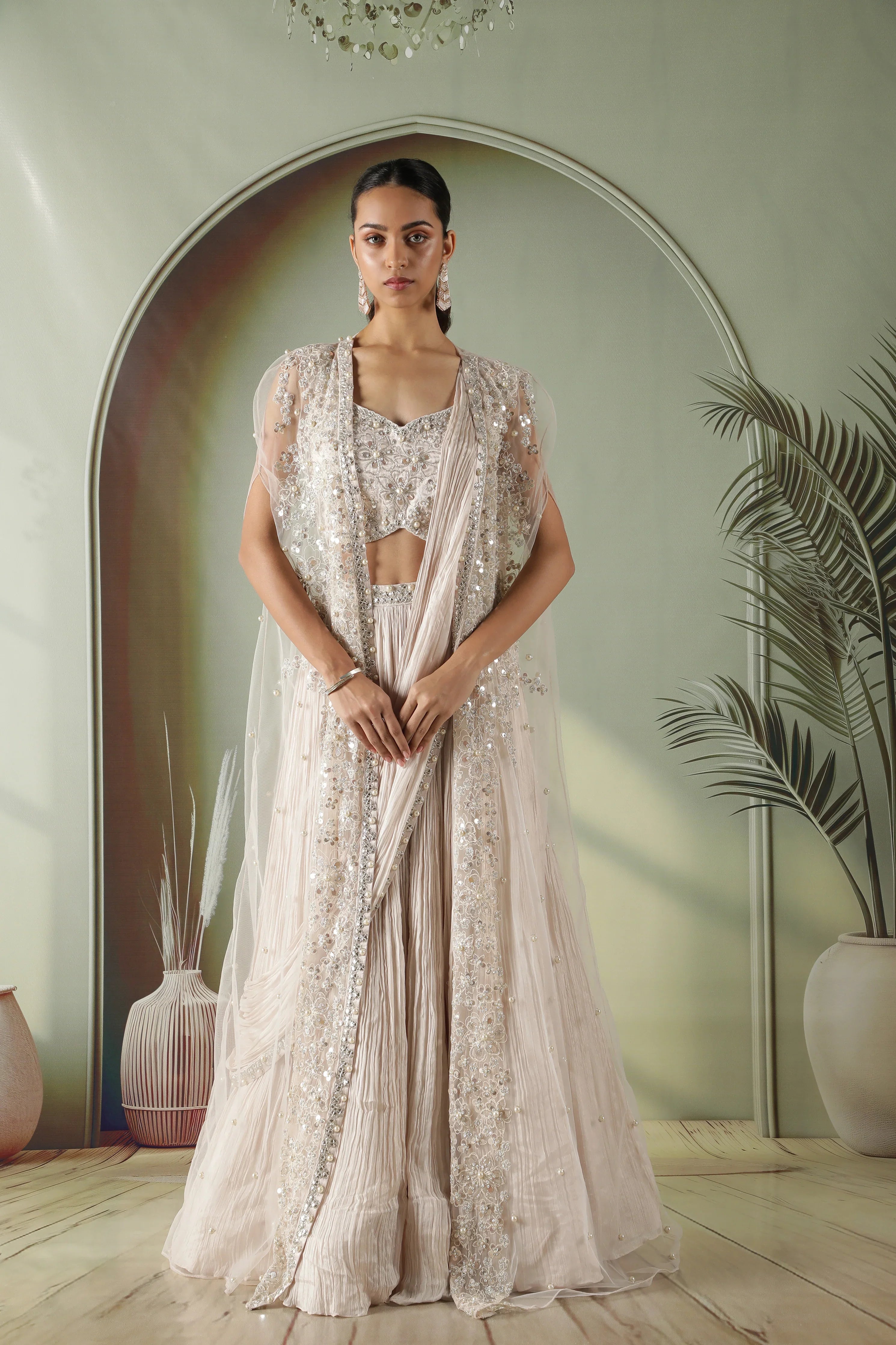 Ivory Silk Lehenga with Draped Dupatta and Embellished Net Cape | Mokshaa