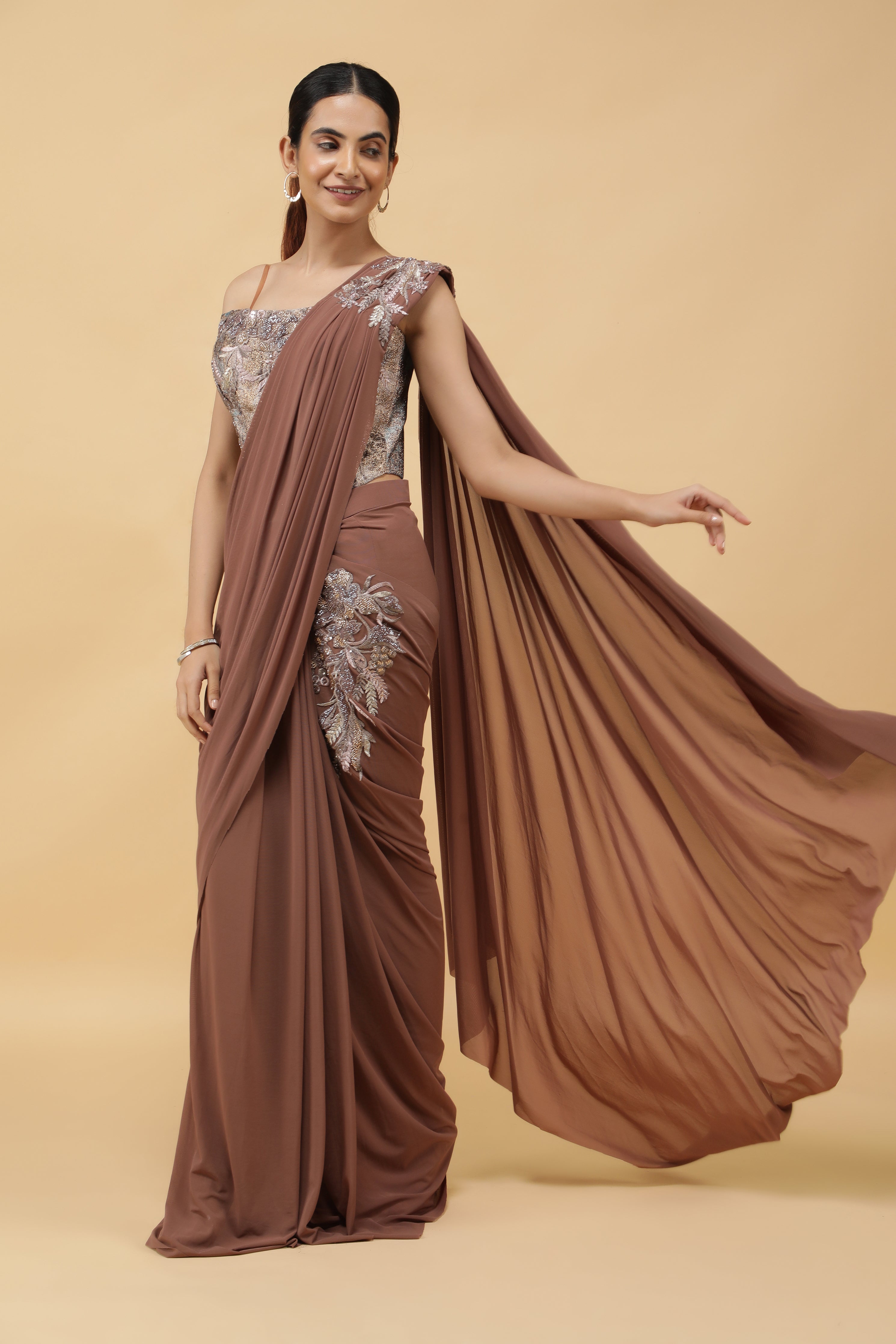 Mocha Lycra Net Drape Saree with Pastel Embroidered Corset Blouse