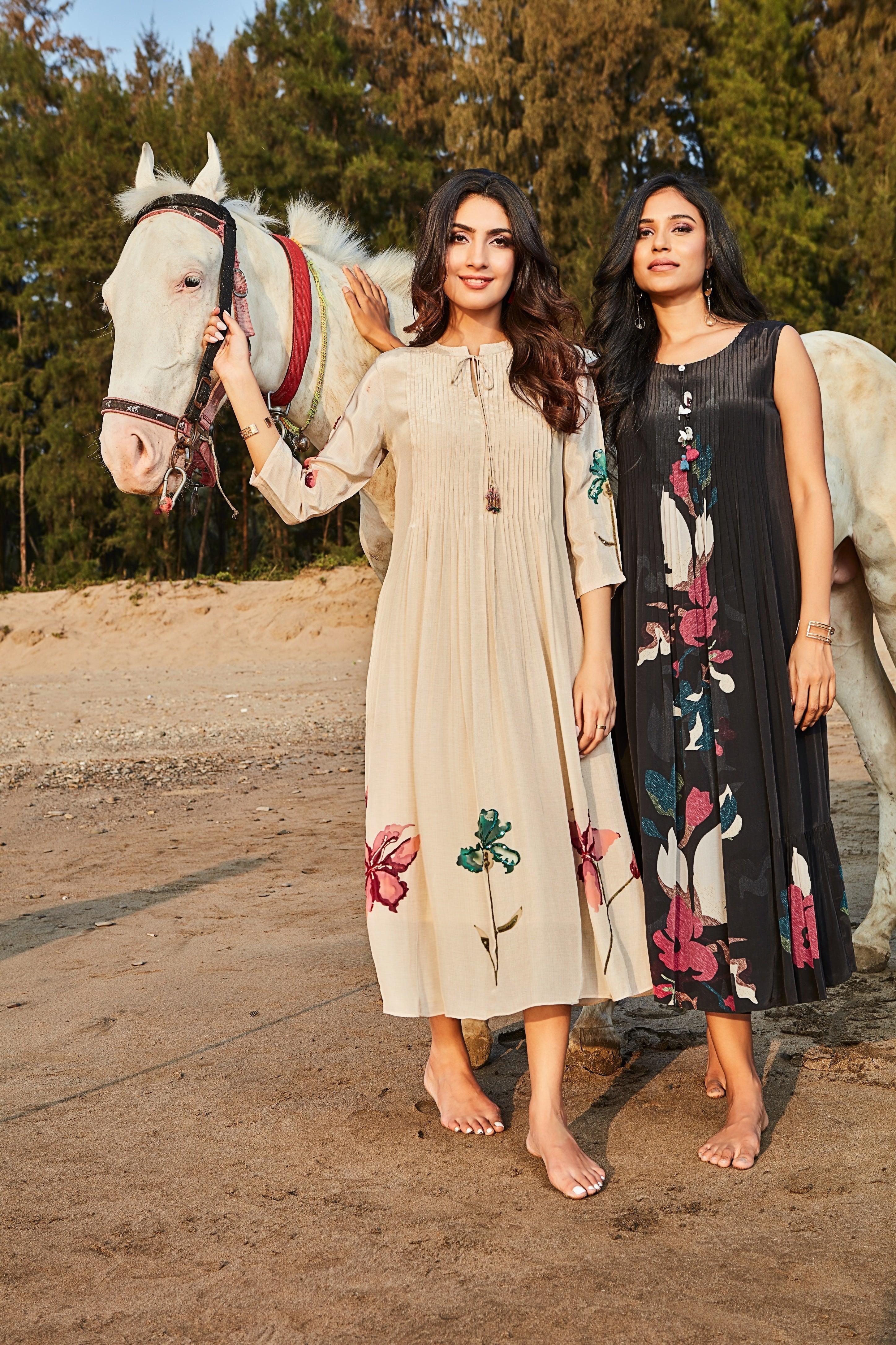 Black Pleated Dress with Bold Floral Print Mokshaa