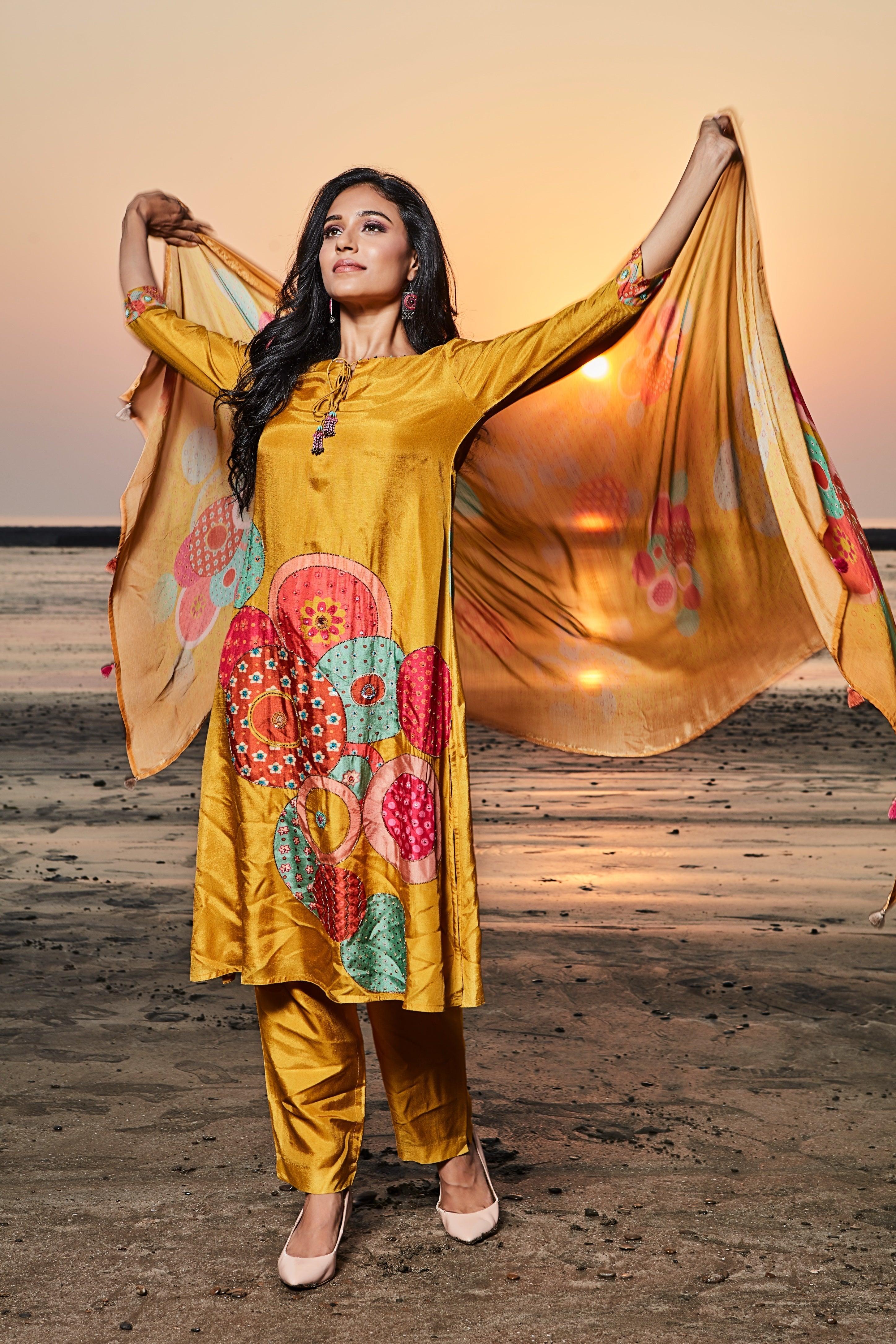 Mustard Yellow Kurta Set with multicolour applique and printed details Mokshaa