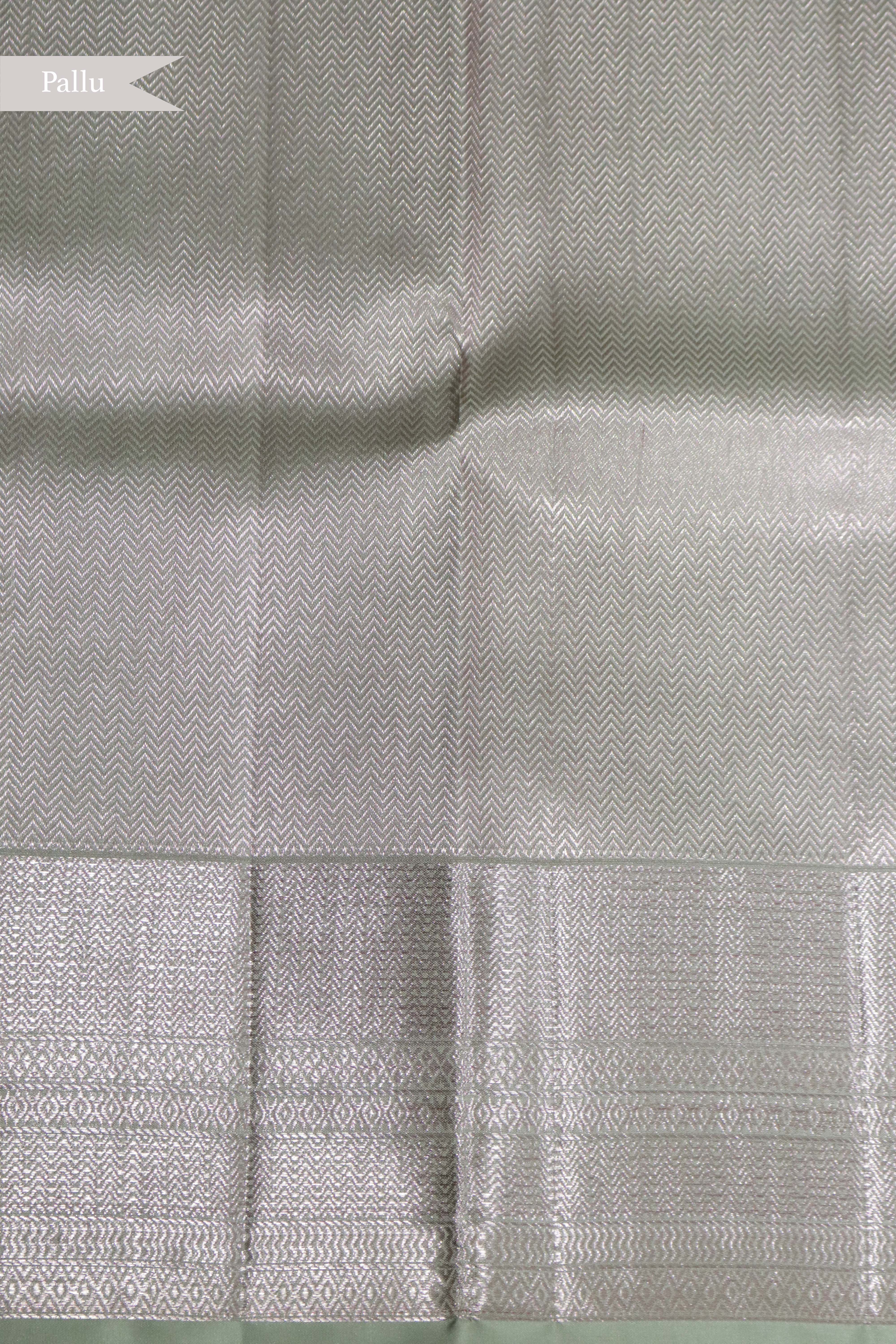 Pastel Green Kanchipuram Silk Saree with Rose Gold Zari