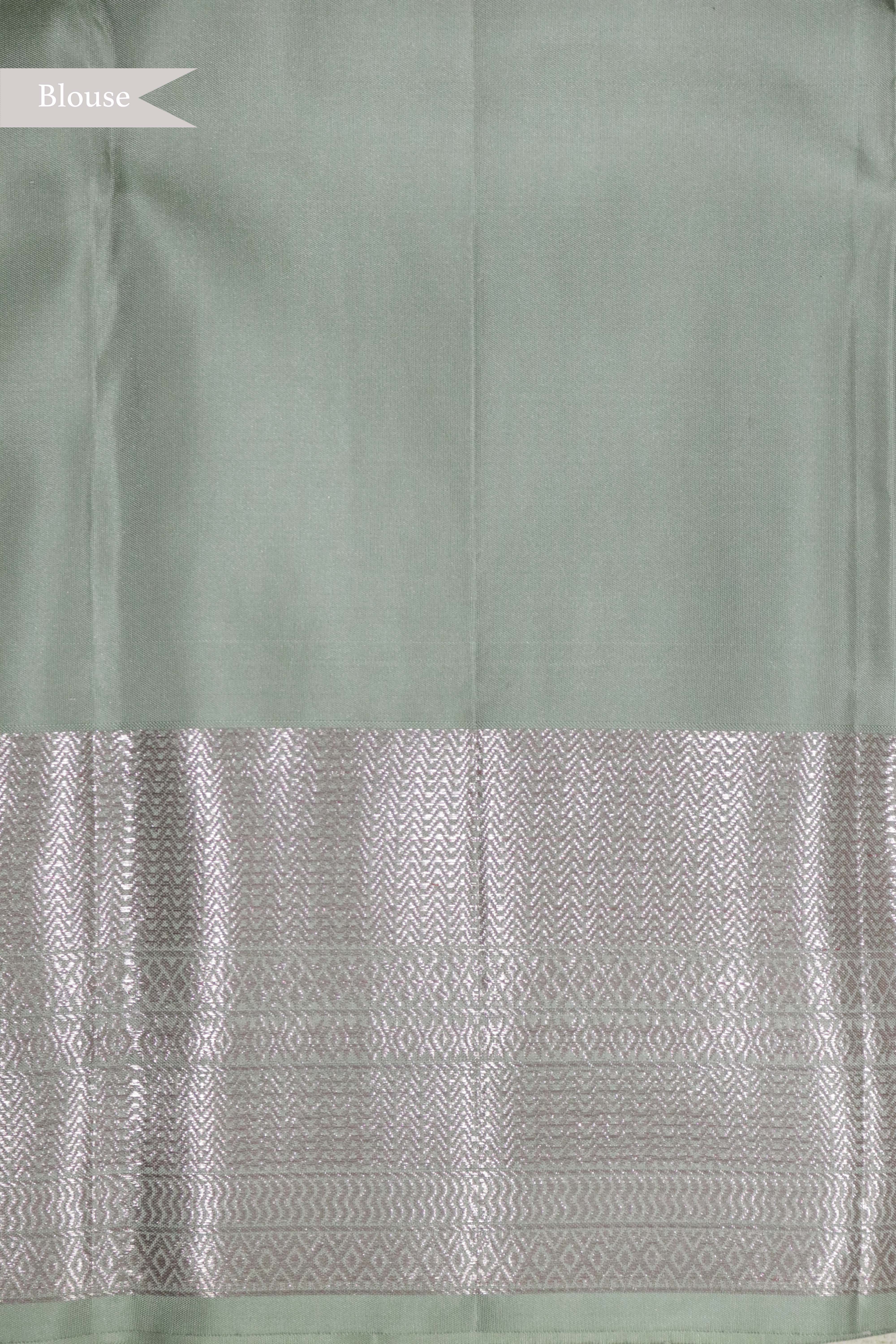Pastel Green Kanchipuram Silk Saree with Rose Gold Zari