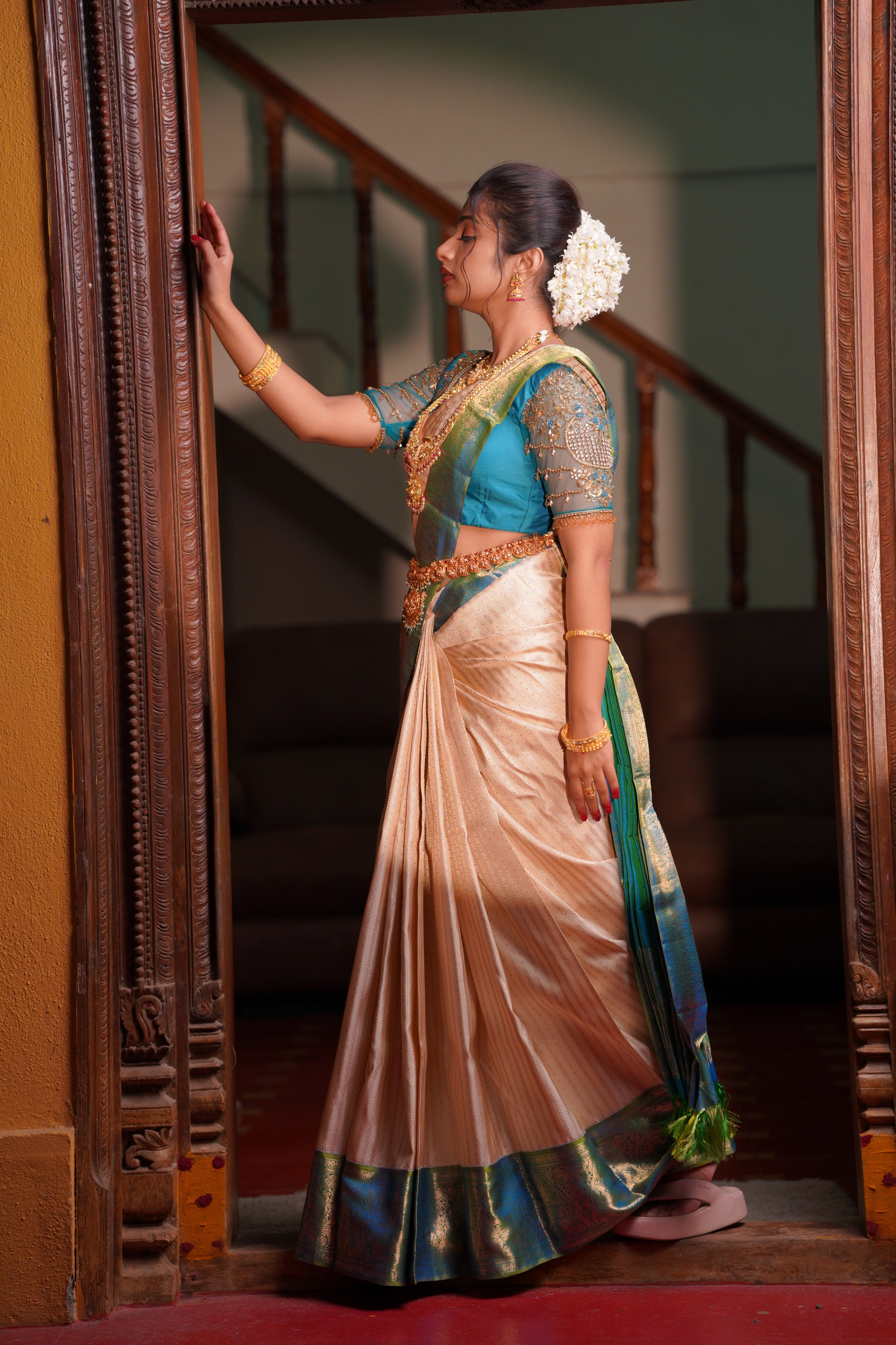 Ivory Kanchipuram Silk Saree with Peacock Blue Zari Border - Mokshaa