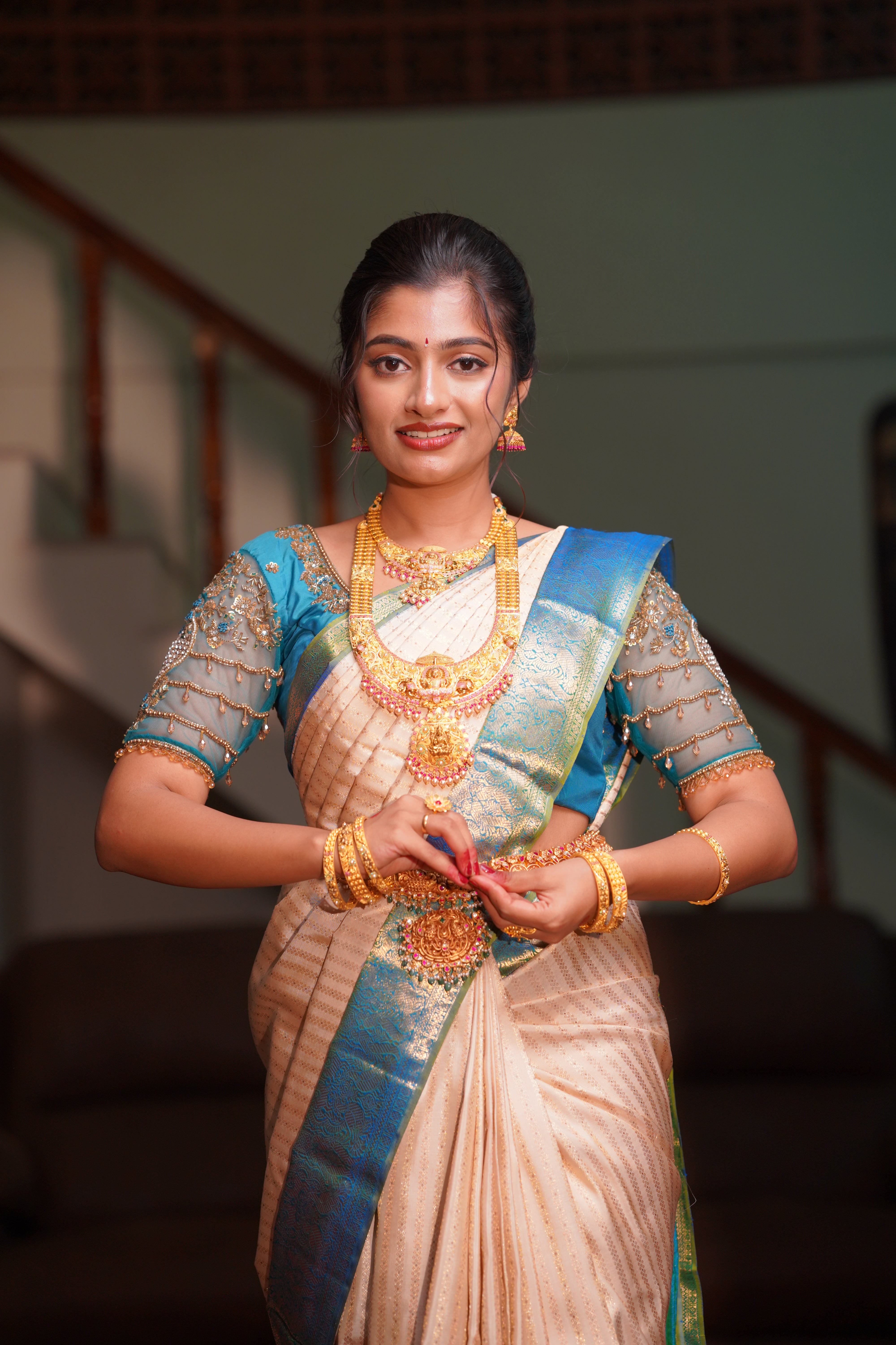 Ivory Kanchipuram Silk Saree with Peacock Blue Zari Border - Mokshaa