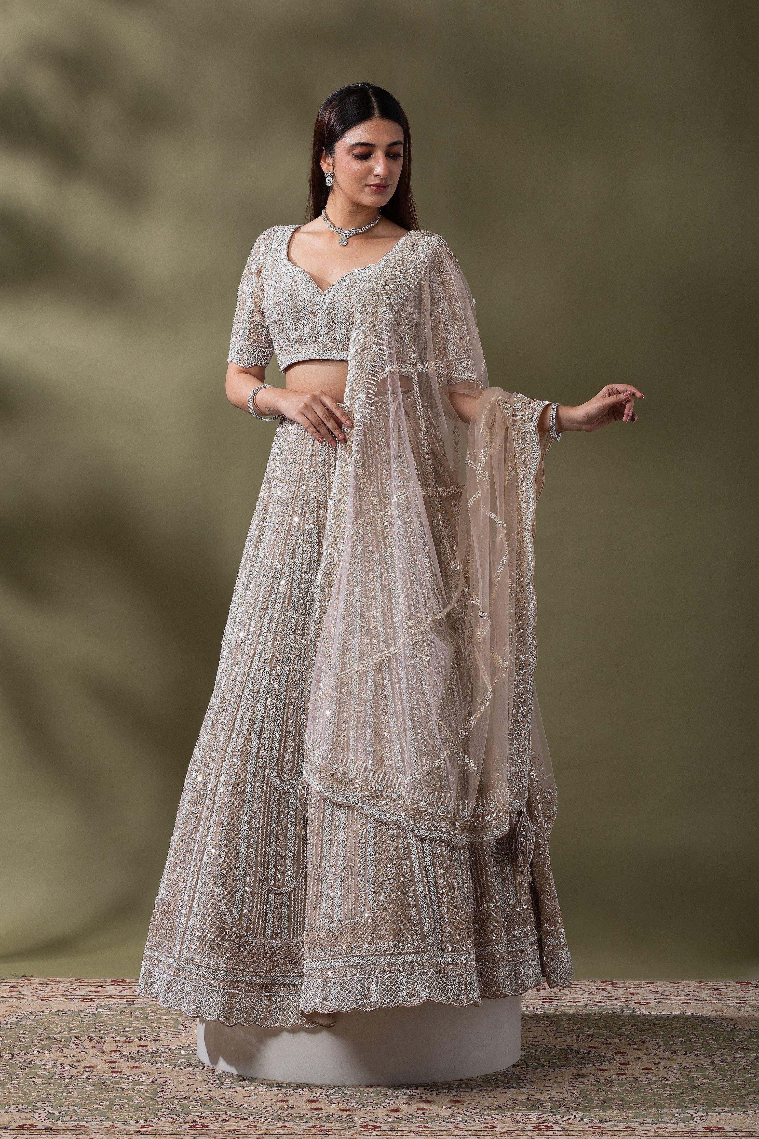 Ivory Sequined Embroidered Lehenga Set Mokshaa
