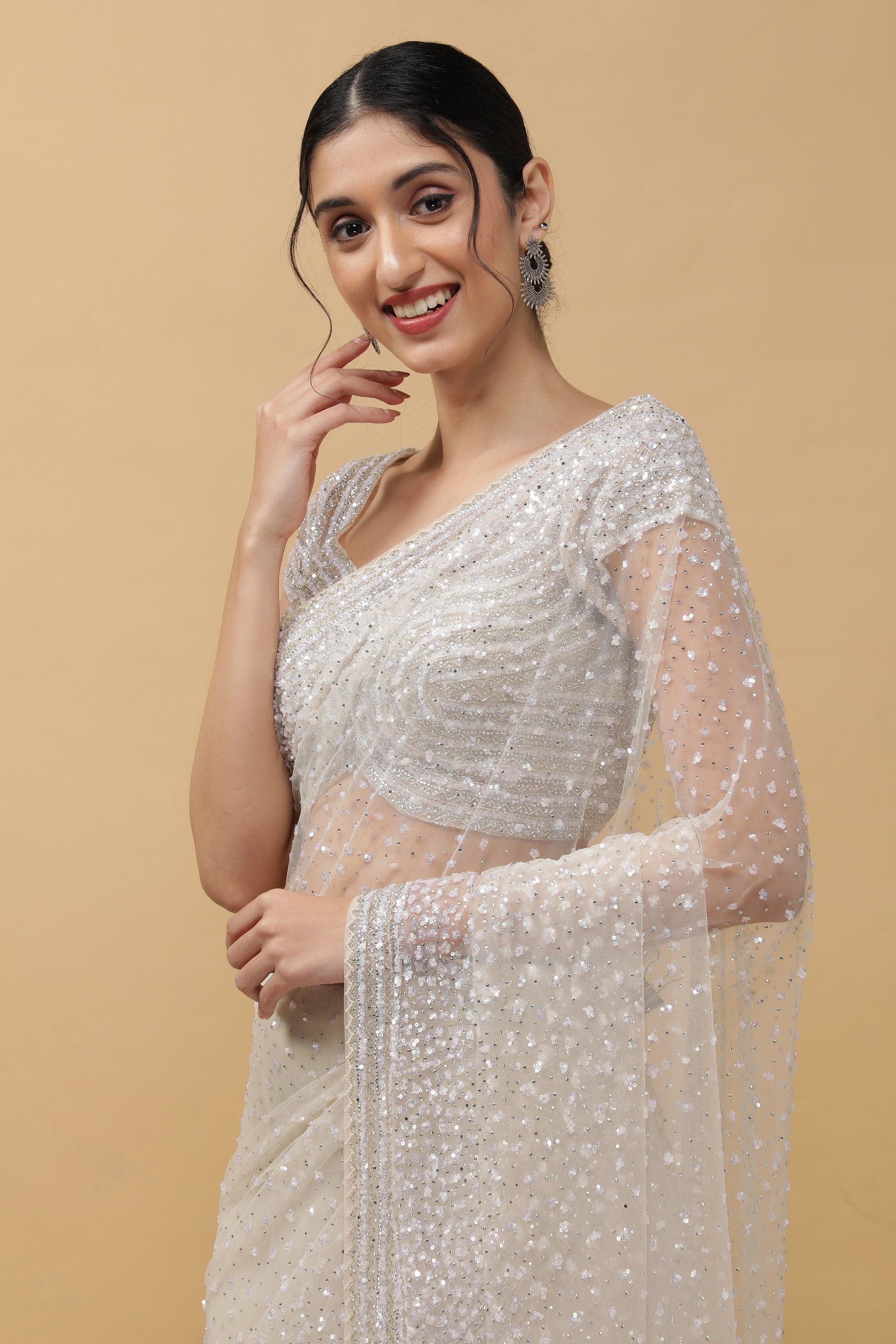 Off White Net Saree With Sequins - Mokshaa