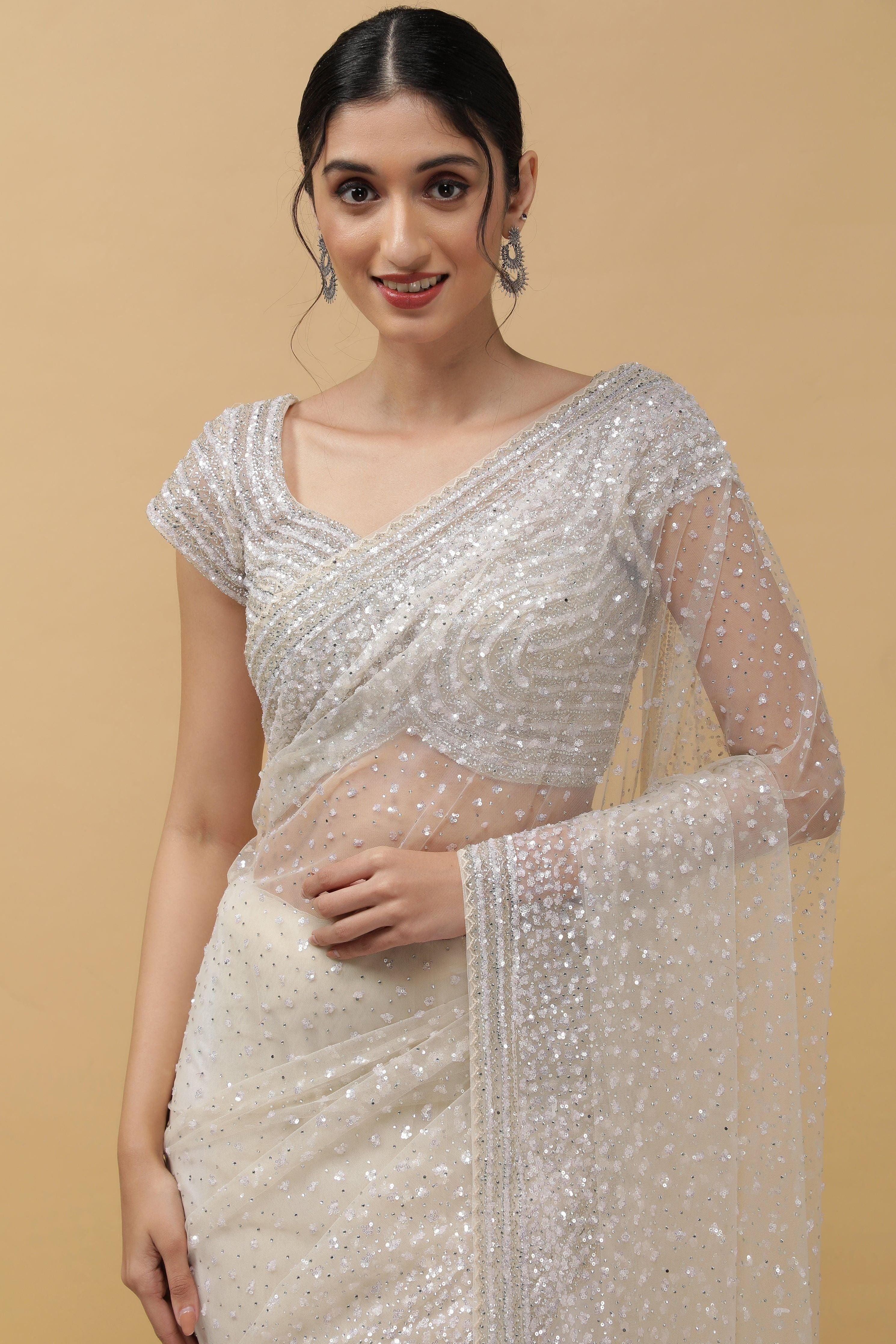 Off White Net Saree With Sequins - Mokshaa