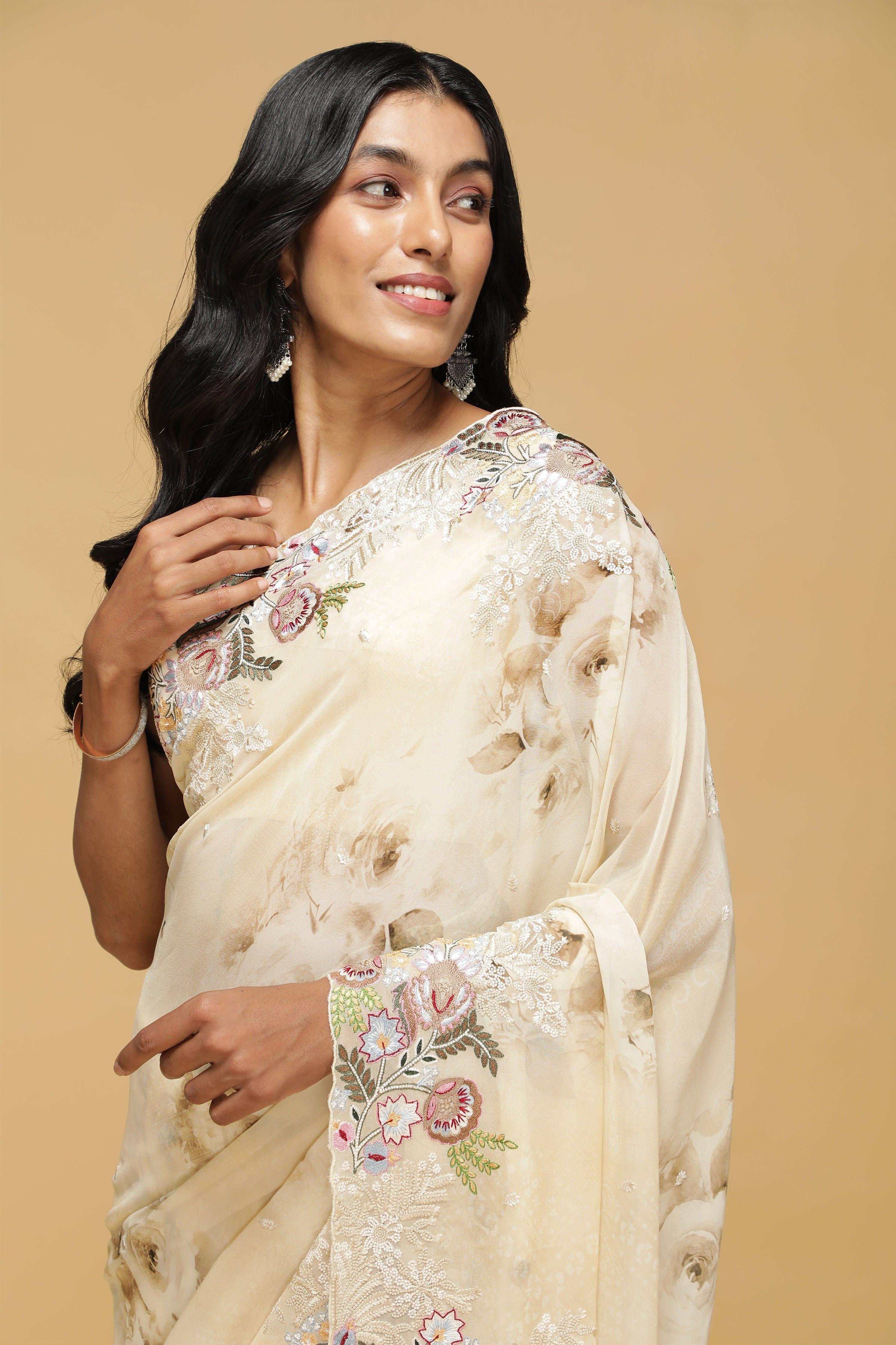 Beige Floral Georgette Saree with Multi-Thread Embroidered Border.