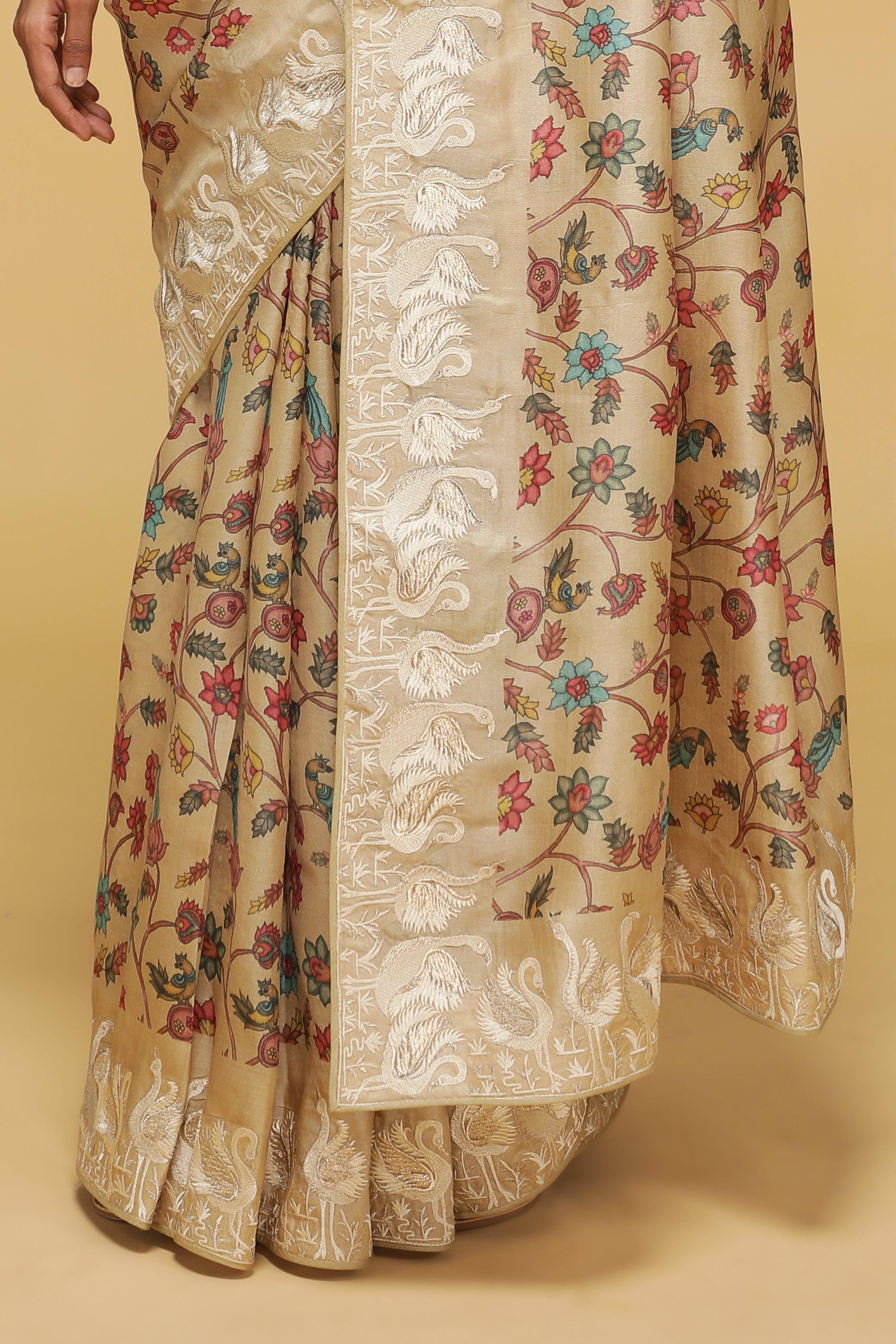 Beige Tussar Saree with Kalamkari Print & Swan Zari Border.