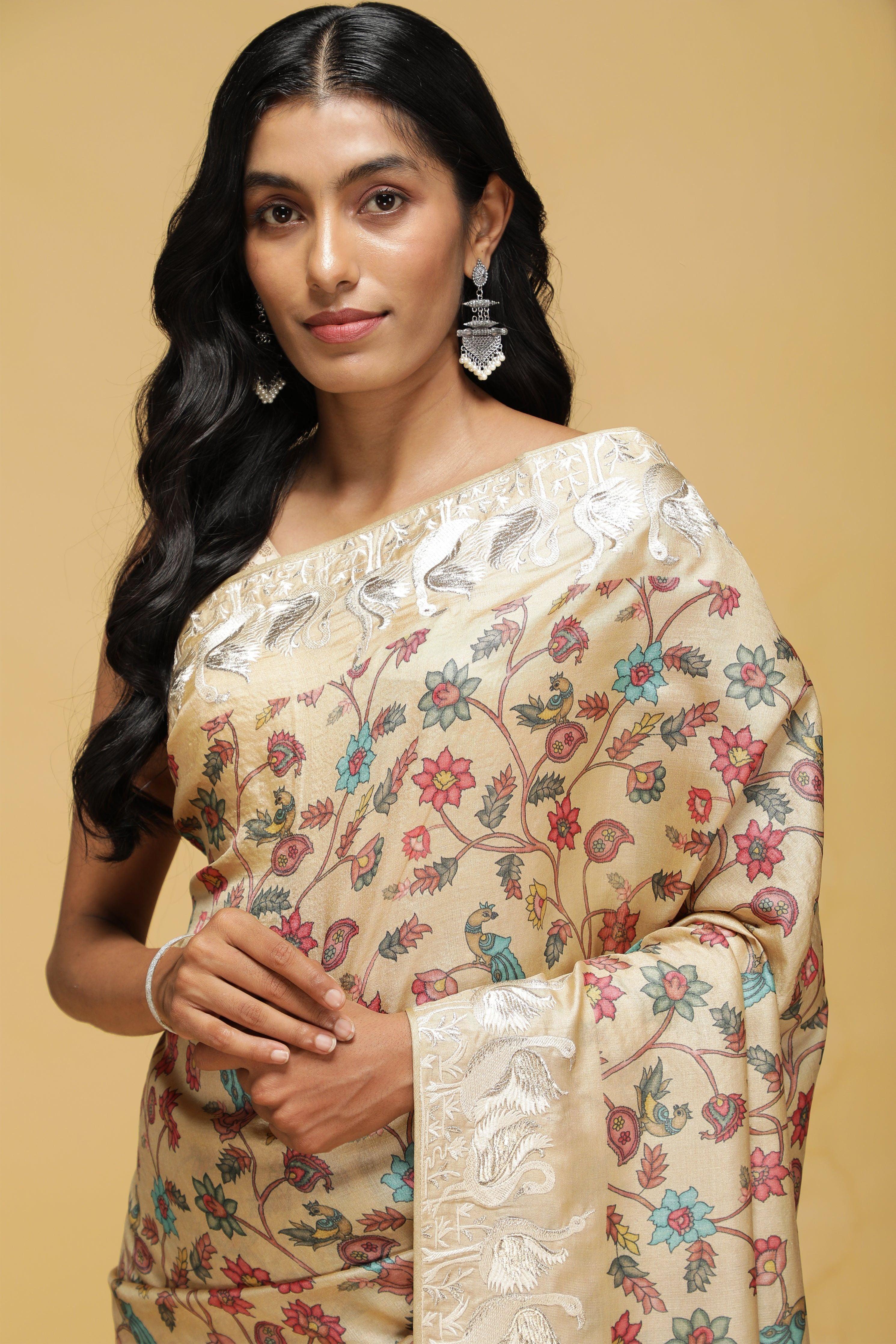 Beige Tussar Saree with Kalamkari Print & Swan Zari Border.