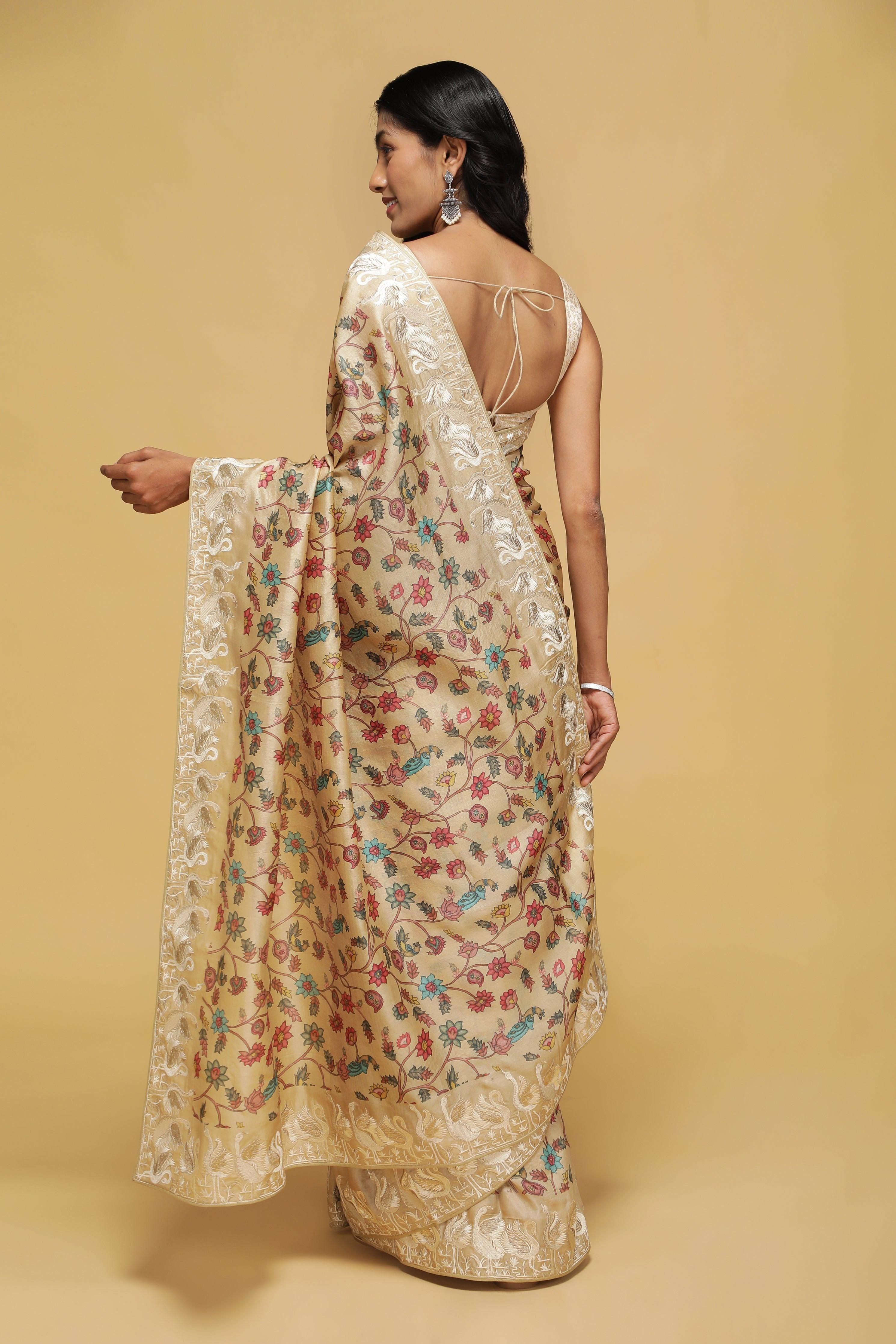 Beige Tussar Saree with Kalamkari Print & Swan Zari Border.