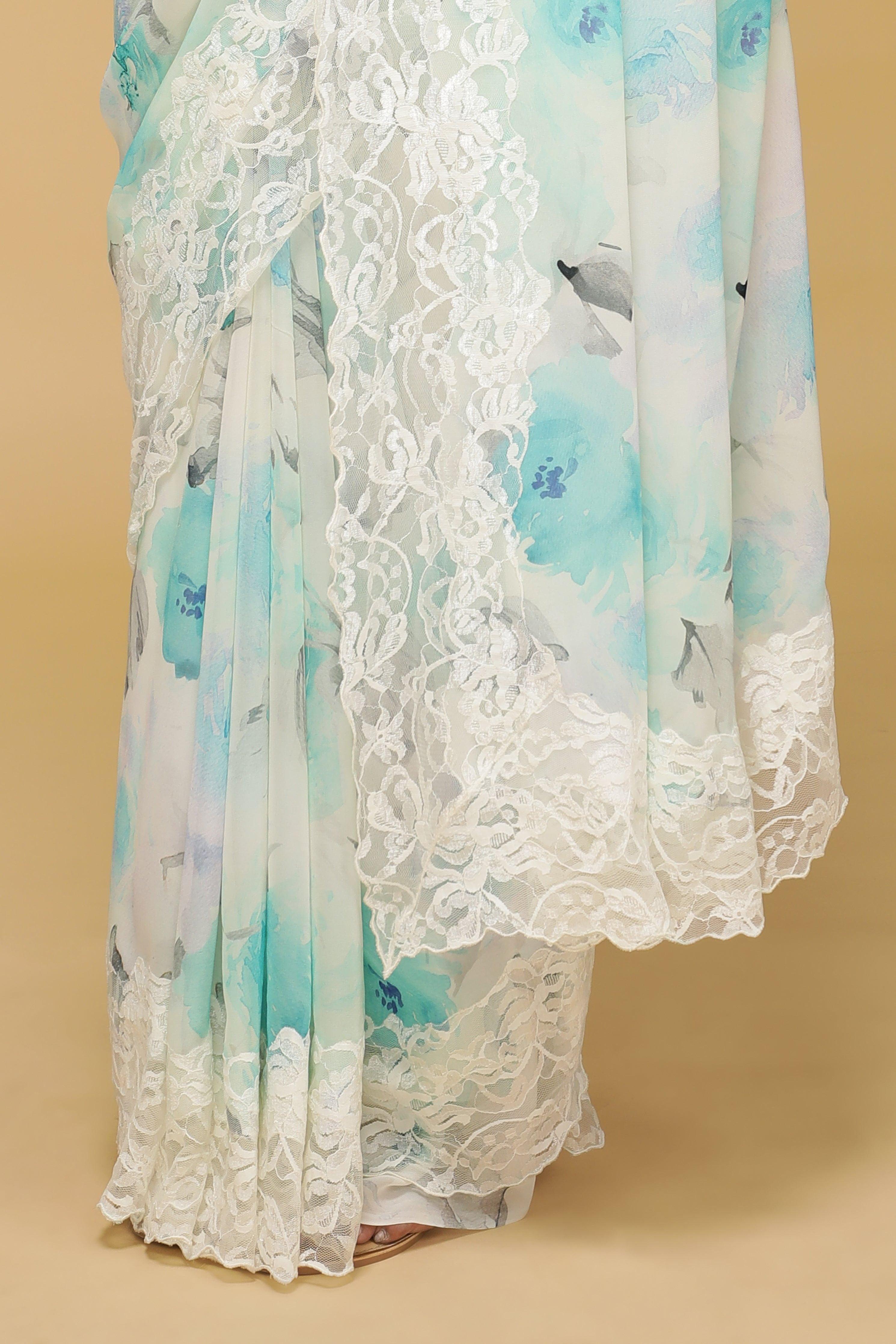 Off-White Floral Georgette Saree with Scalloped Lace Border.