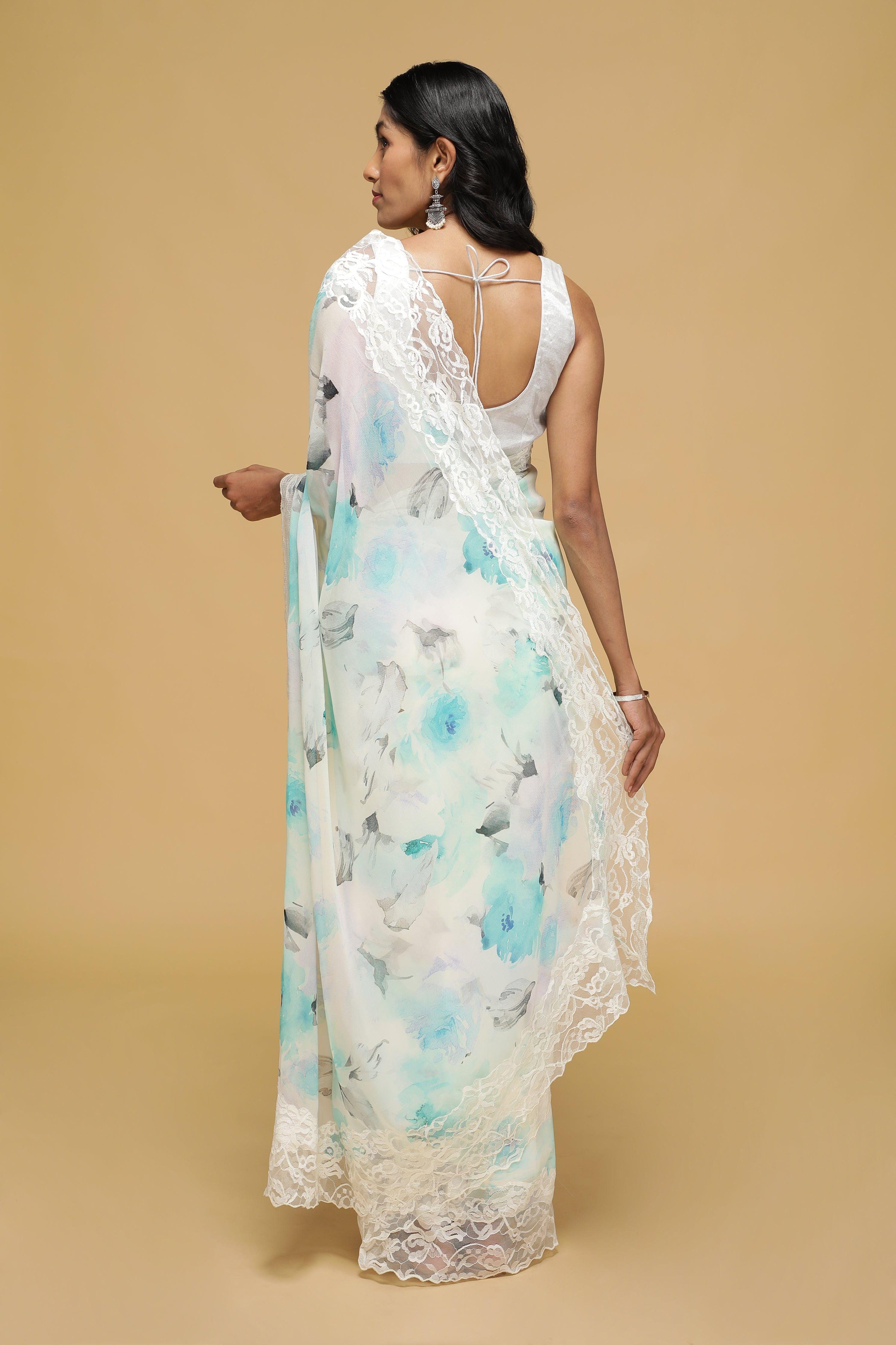 Off-White Floral Georgette Saree with Scalloped Lace Border.