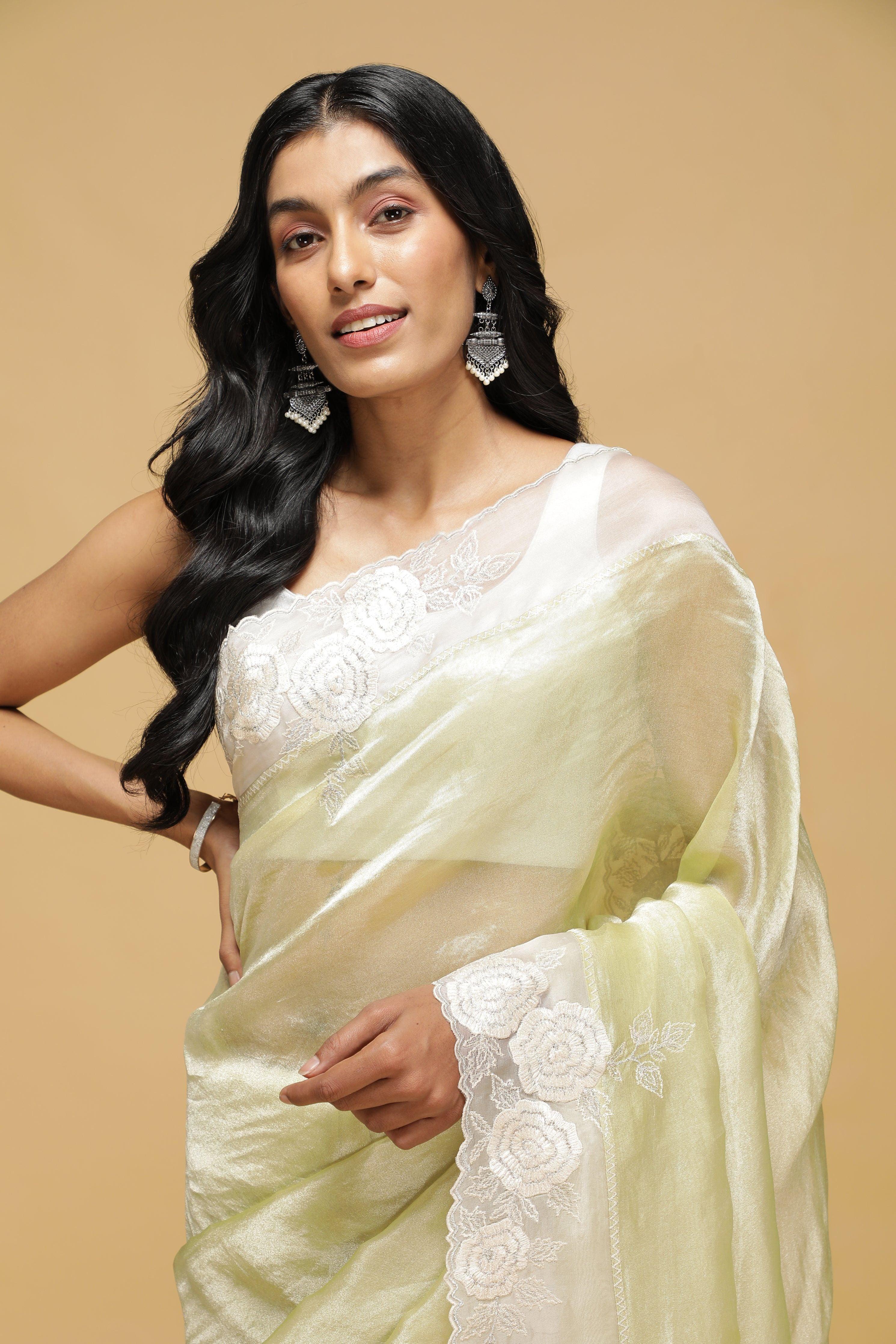 Sea Green Organza Saree with White Thread Border.