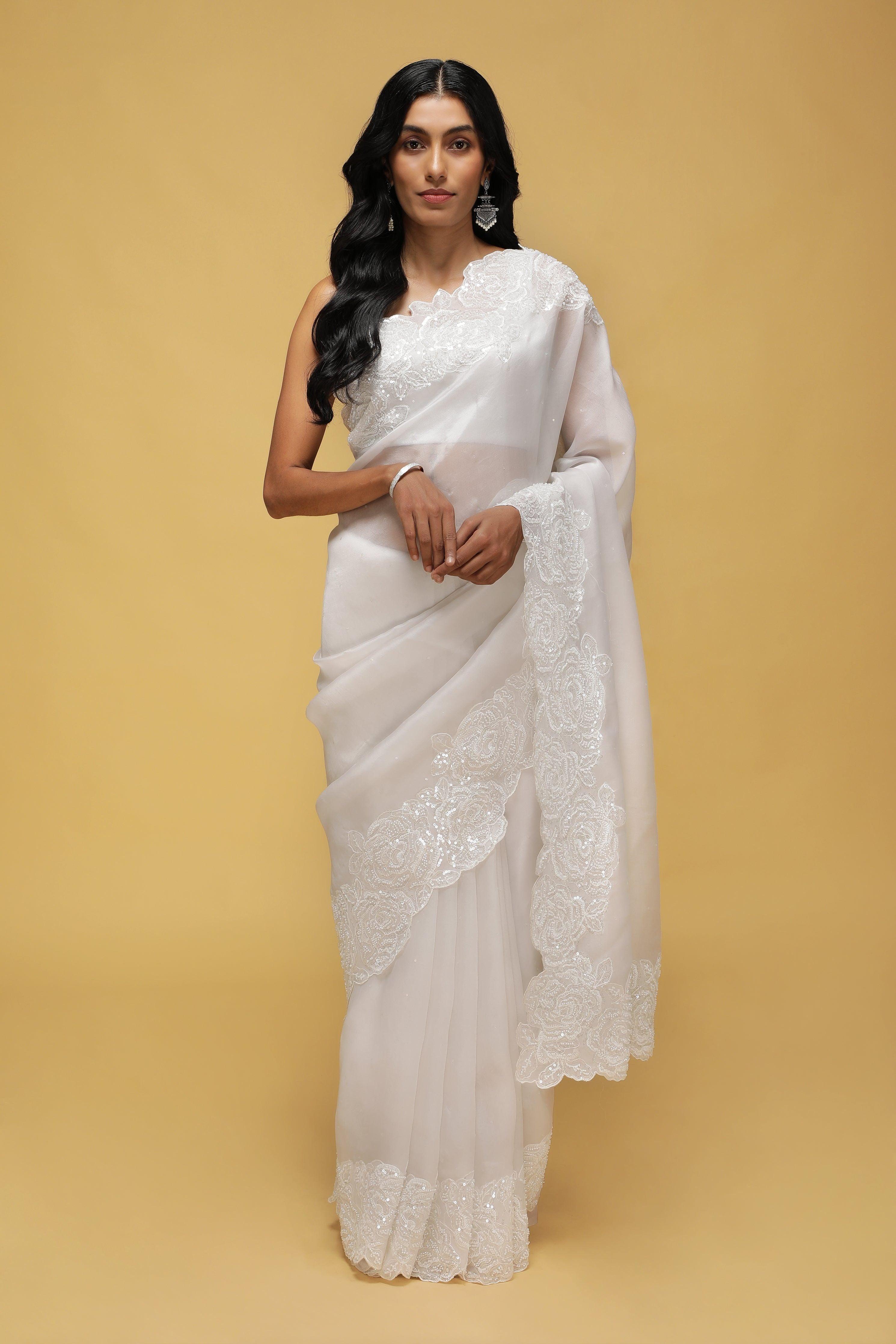Off-White Organza Saree with Sequin & Thread Border.