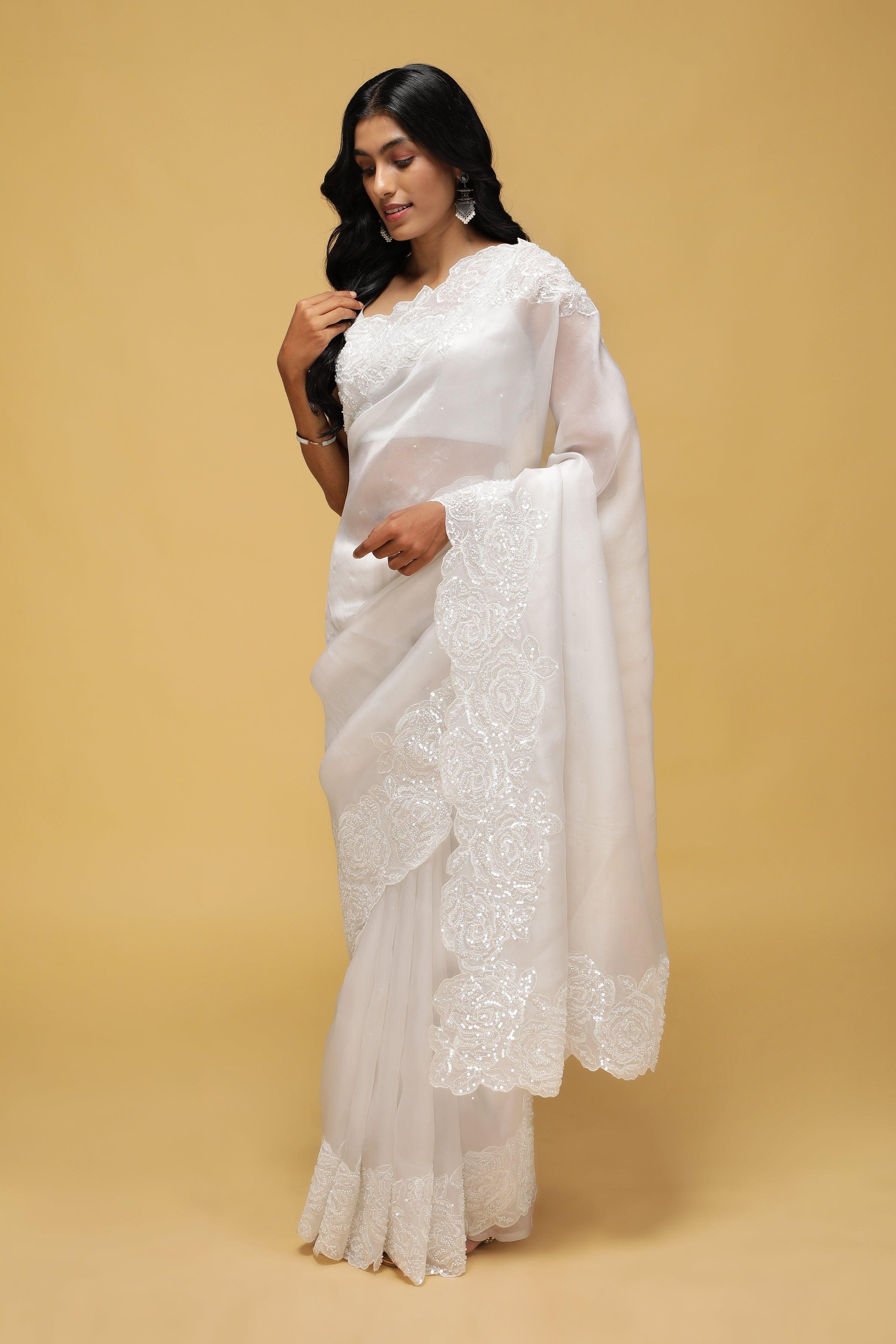 Off-White Organza Saree with Sequin & Thread Border.