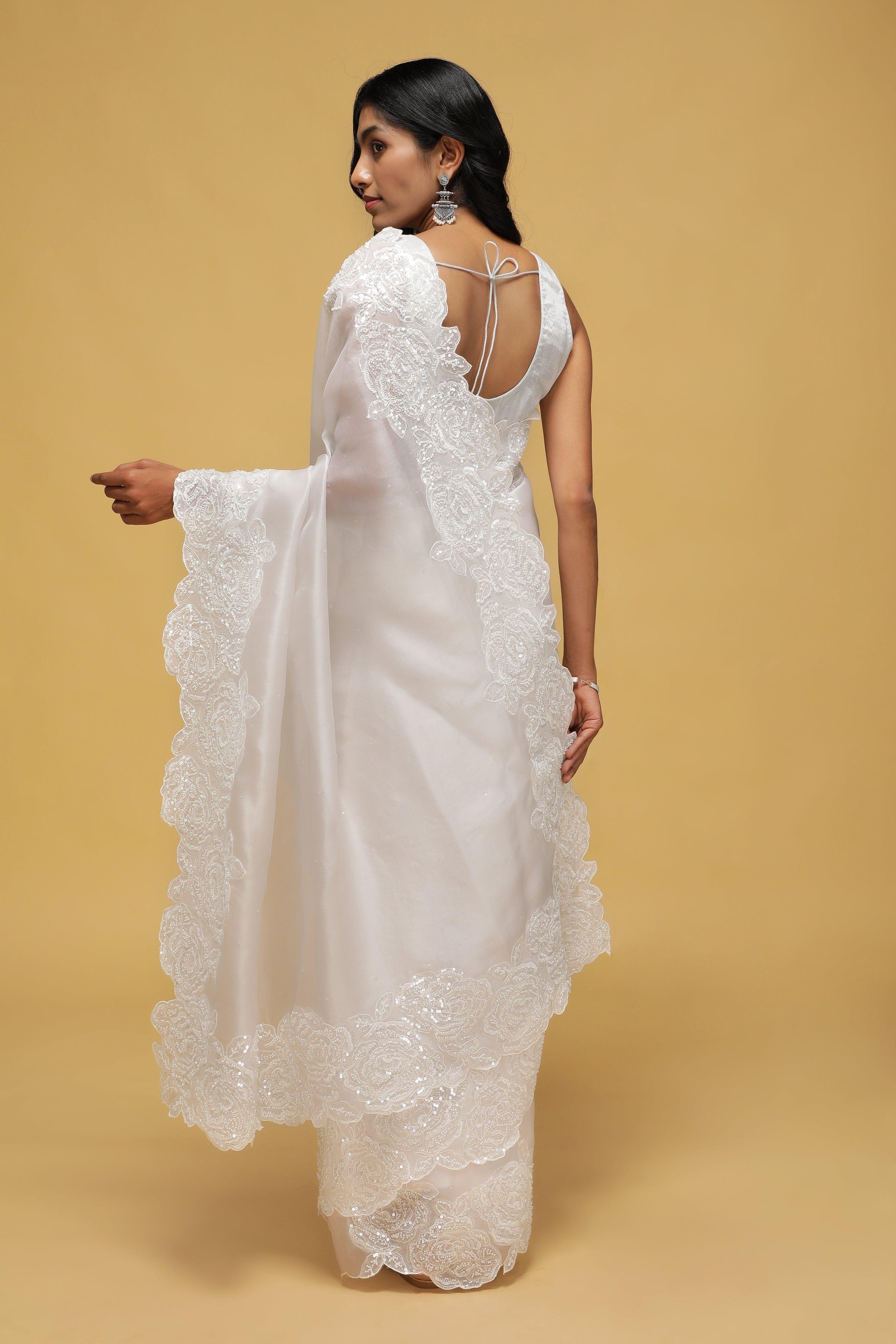 Off-White Organza Saree with Sequin & Thread Border.