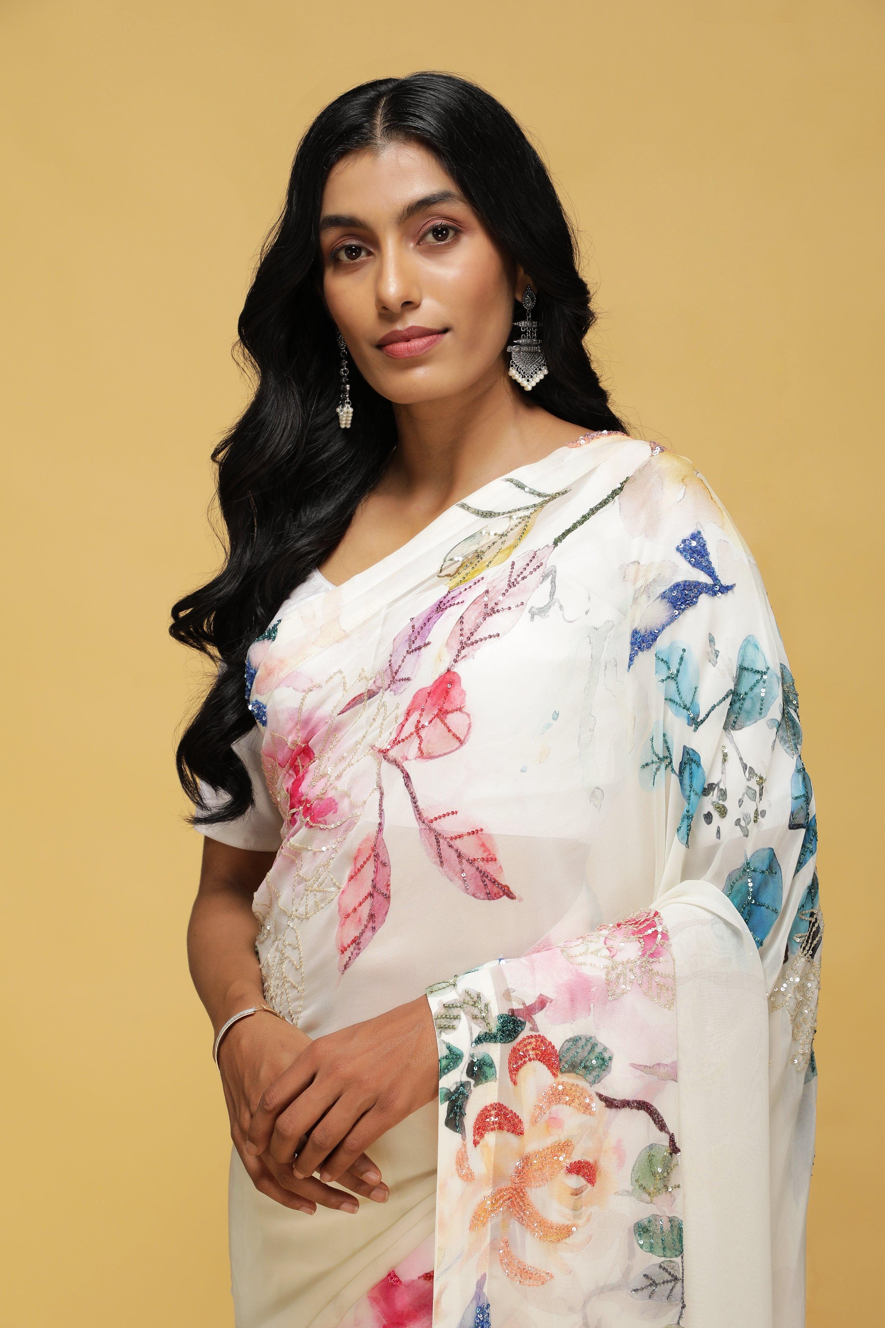 Off-White Georgette Saree with Printed Sequin Border.