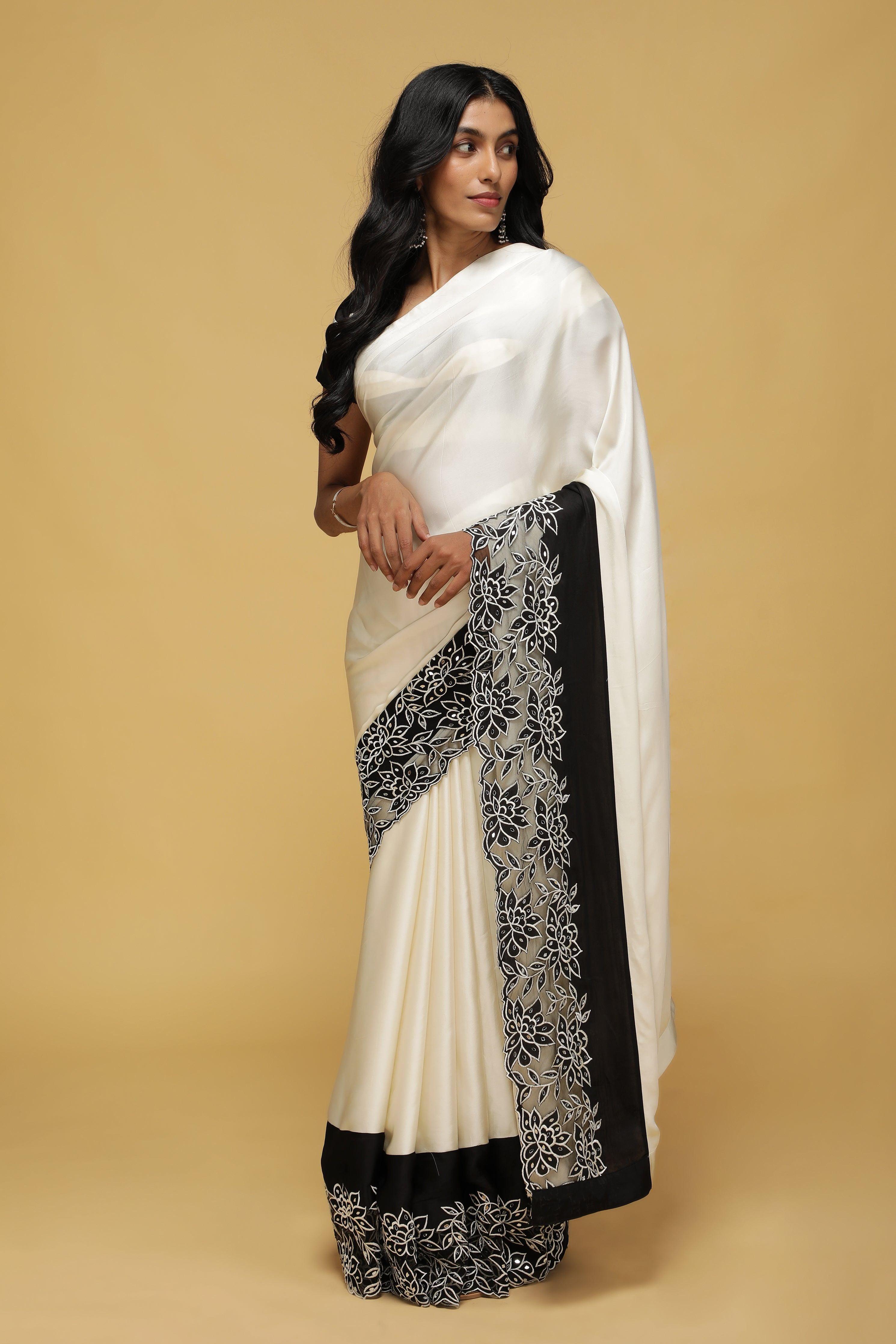 Off-White Satin Saree with Black Mirror & Thread Embroidery Border.