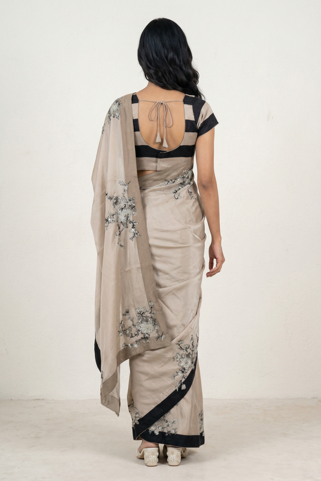 Beige Satin Saree with Black Border and Floral Appliqué Work Blouse