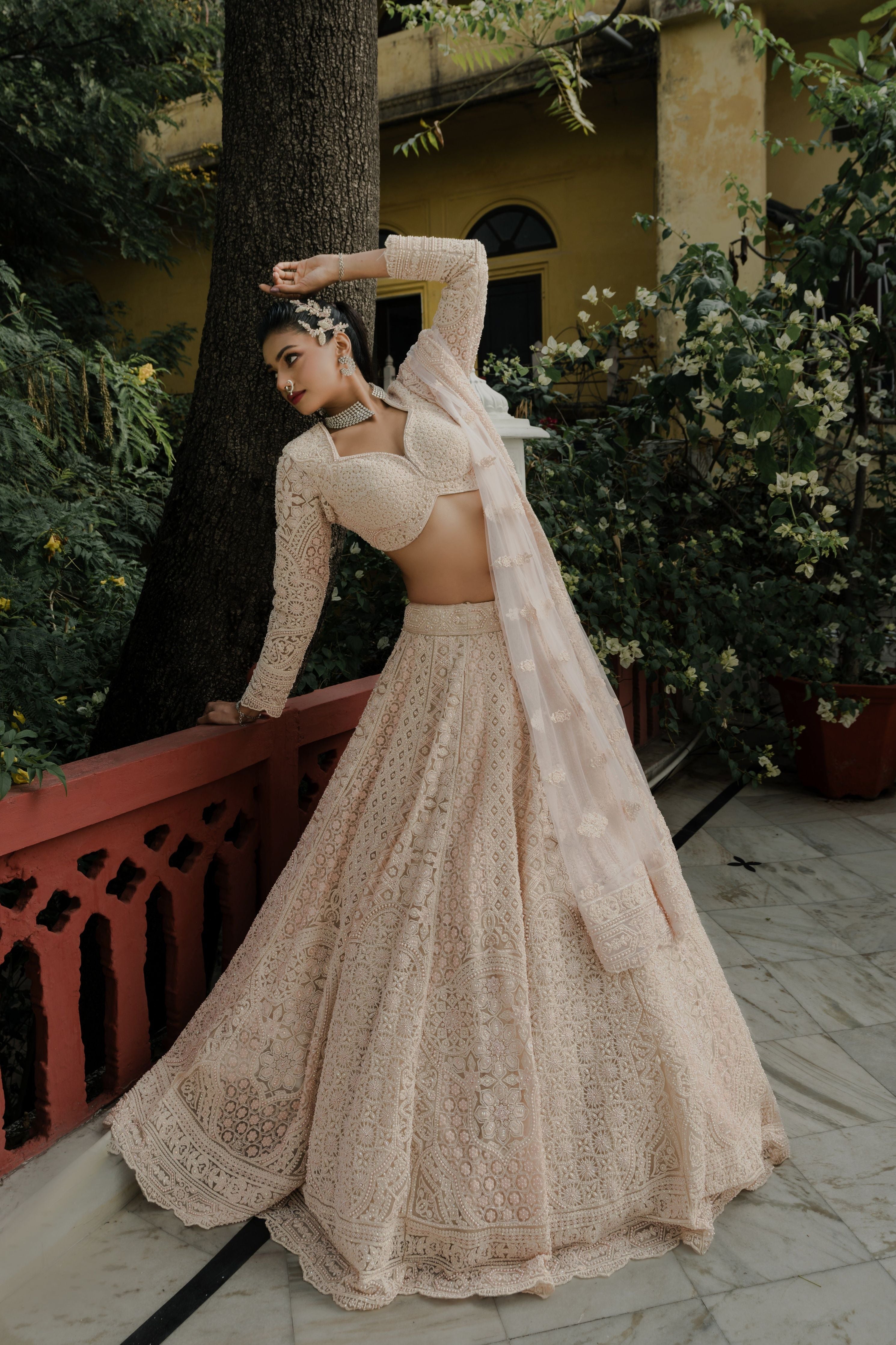 Blush Peach Net Lehenga with All-Over Resham & Sequin Embroidery Mokshaa