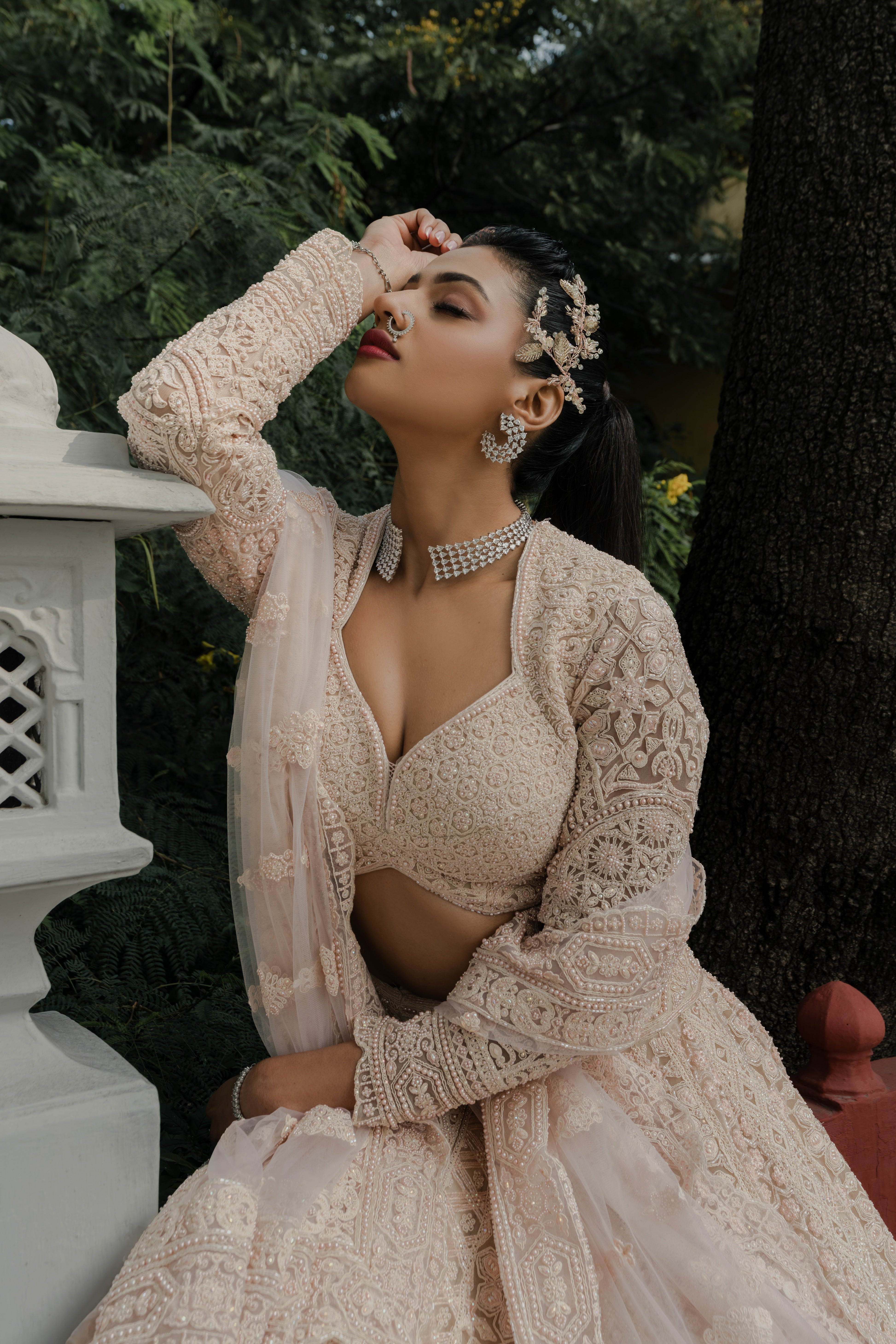 Blush Peach Net Lehenga with All-Over Resham & Sequin Embroidery Mokshaa