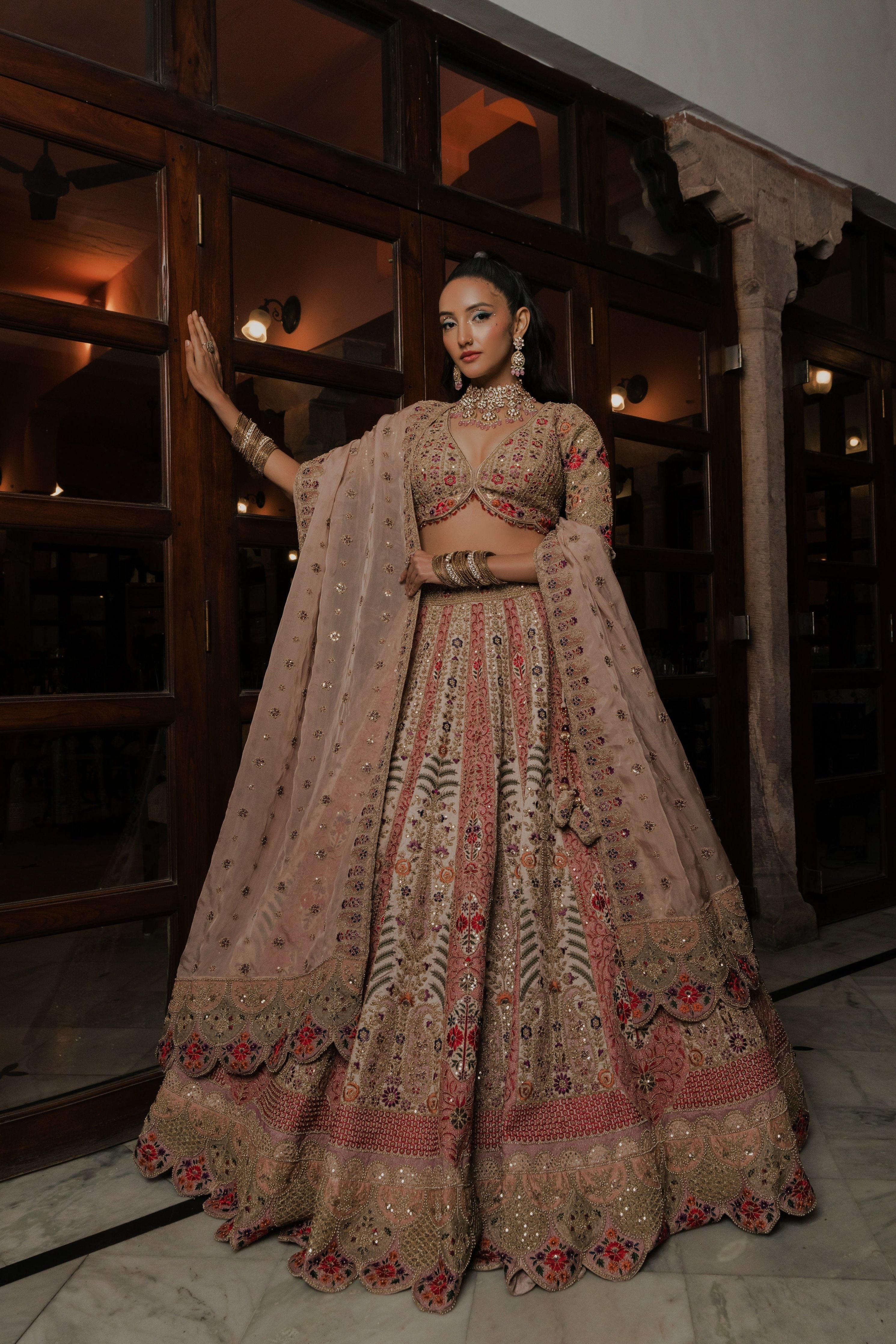 Champagne Gold Net Lehenga with Multicolor Floral Embroidery Mokshaa