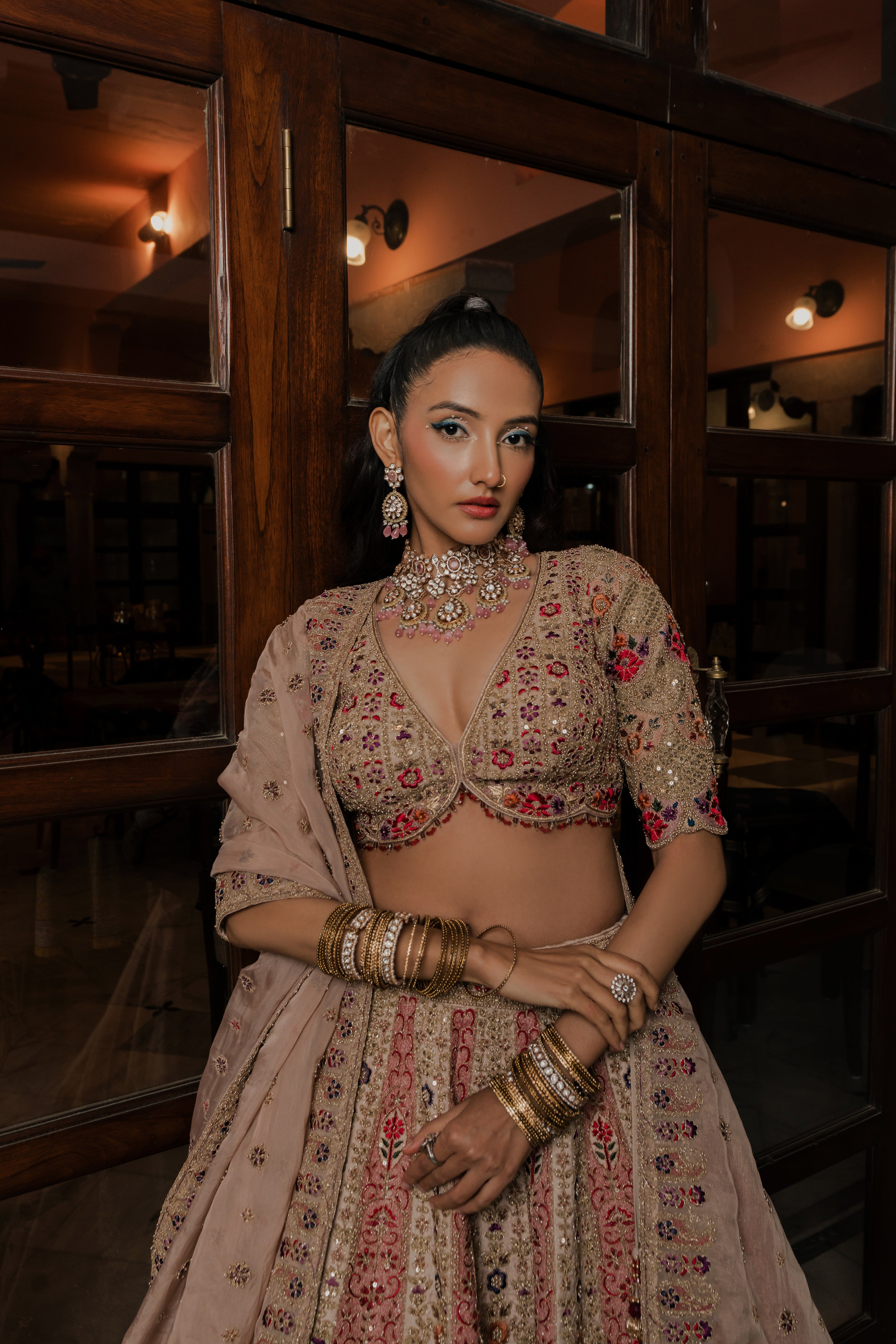 Champagne Gold Net Lehenga with Multicolor Floral Embroidery Mokshaa