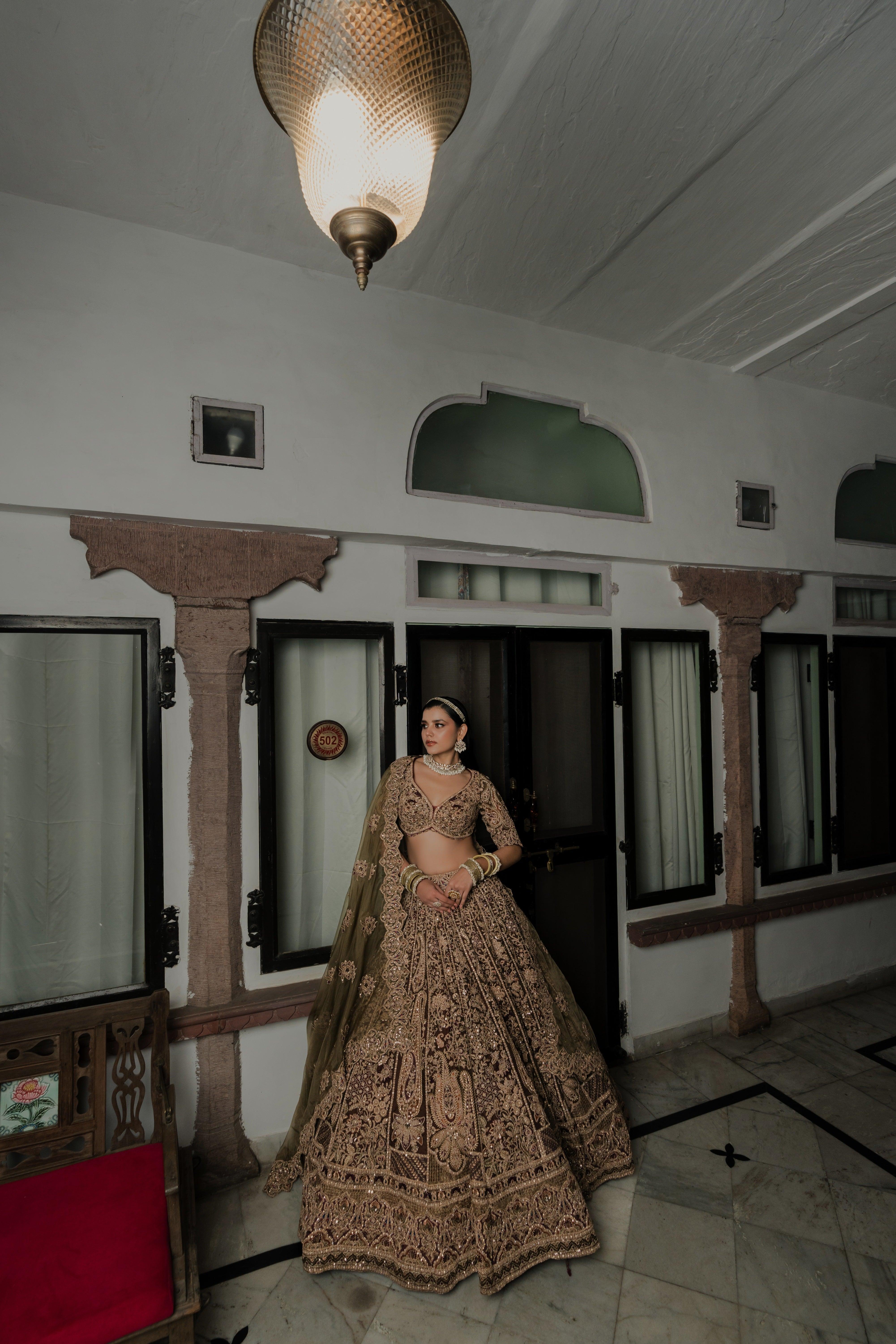 Olive Green Velvet Bridal Lehenga with Antique Zardosi & Sequin Embroidery Mokshaa