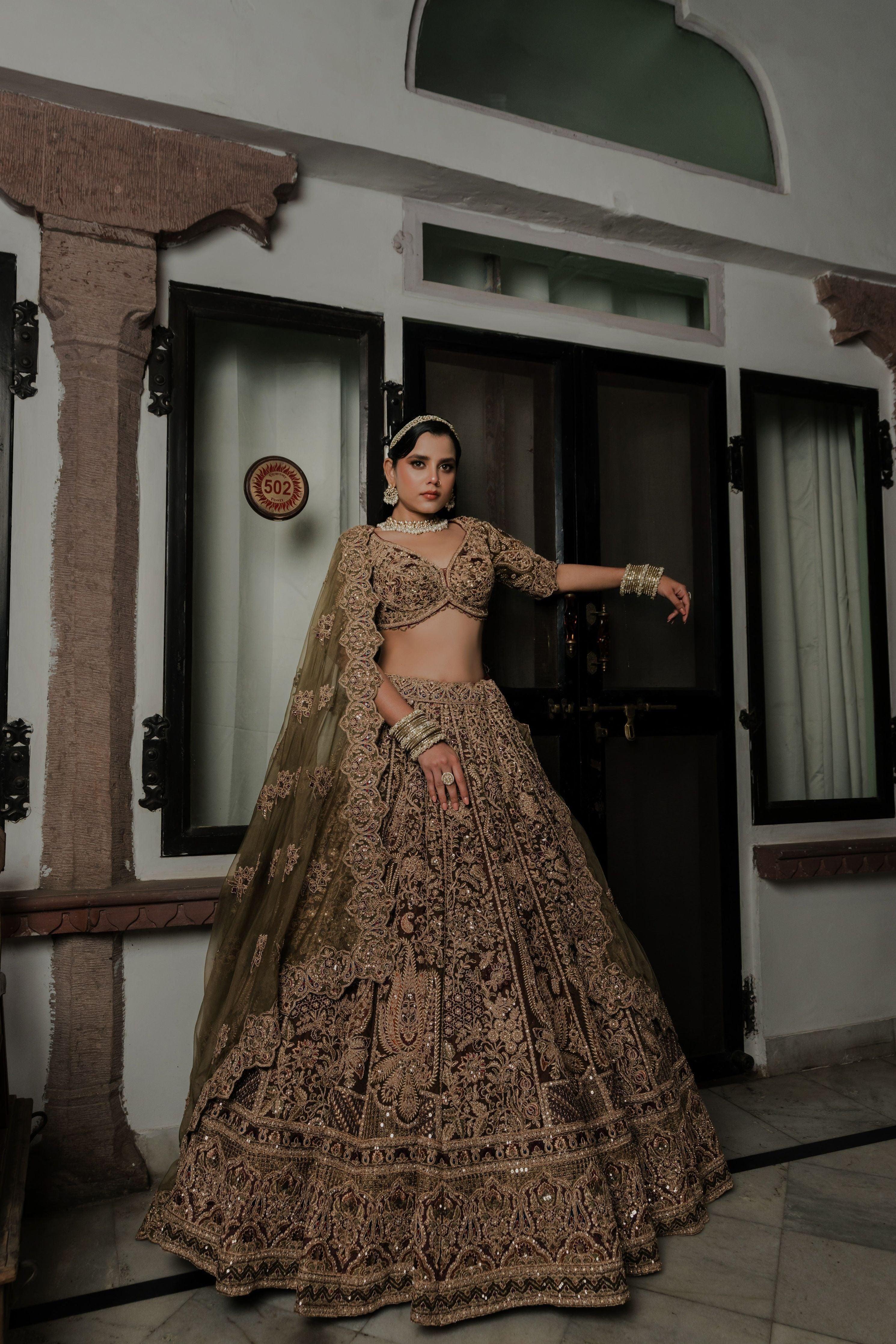 Olive Green Velvet Bridal Lehenga with Antique Zardosi & Sequin Embroidery Mokshaa