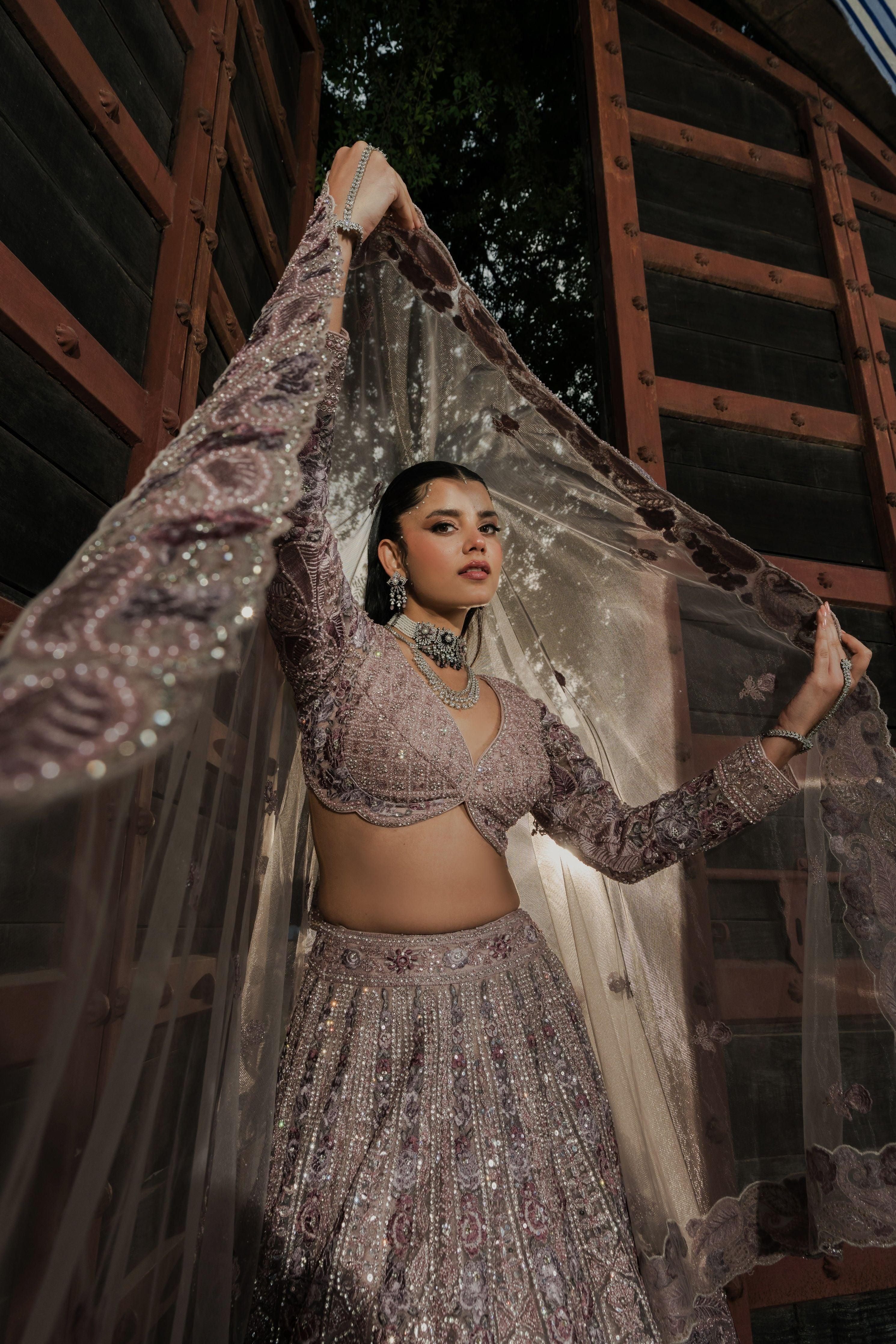 Dusty Lilac Net Lehenga with Intricate Sequin and Thread Embroidery Mokshaa