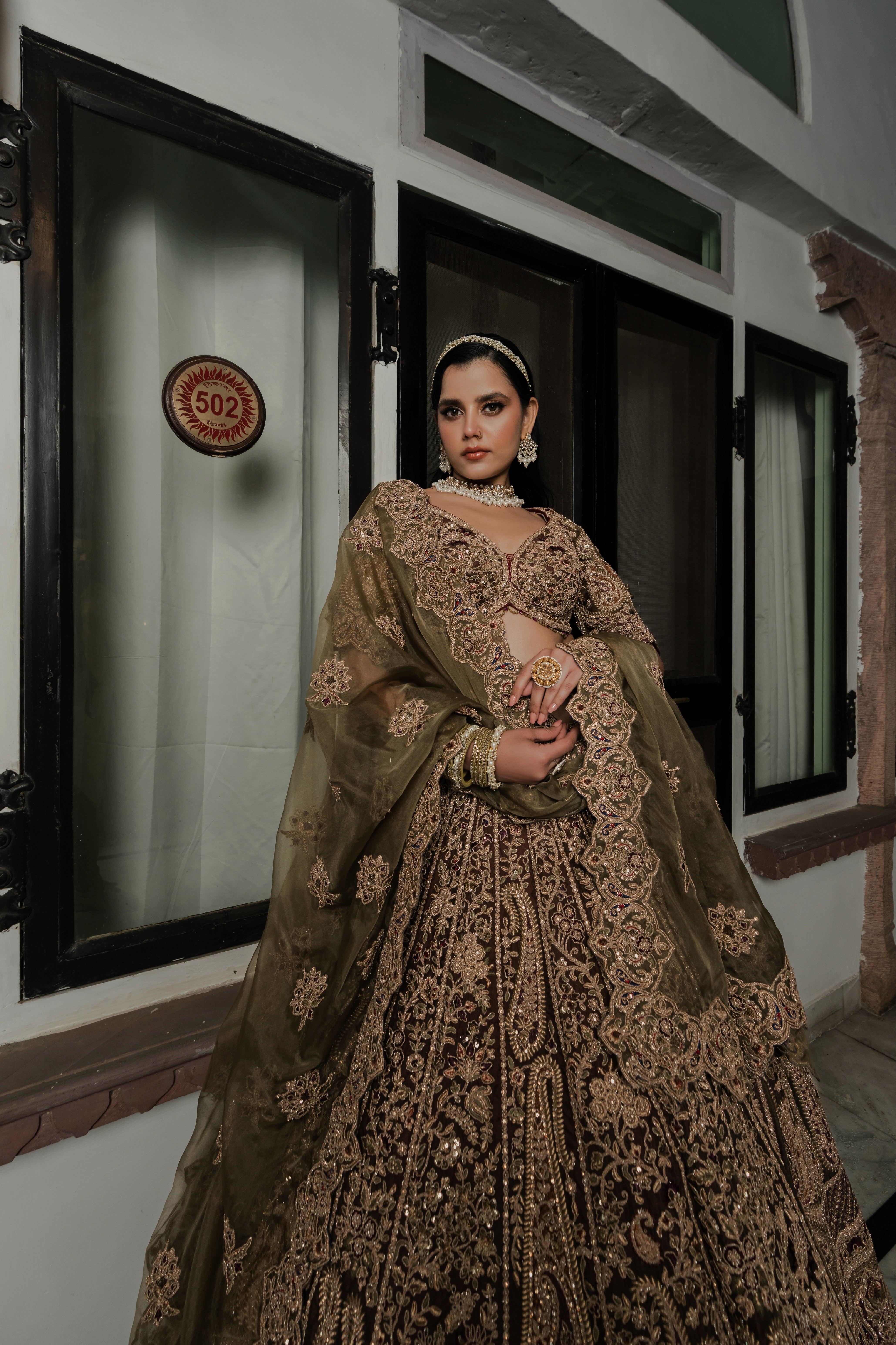 Olive Green Net Bridal Lehenga with Antique Zardosi & Sequin Embroidery Mokshaa