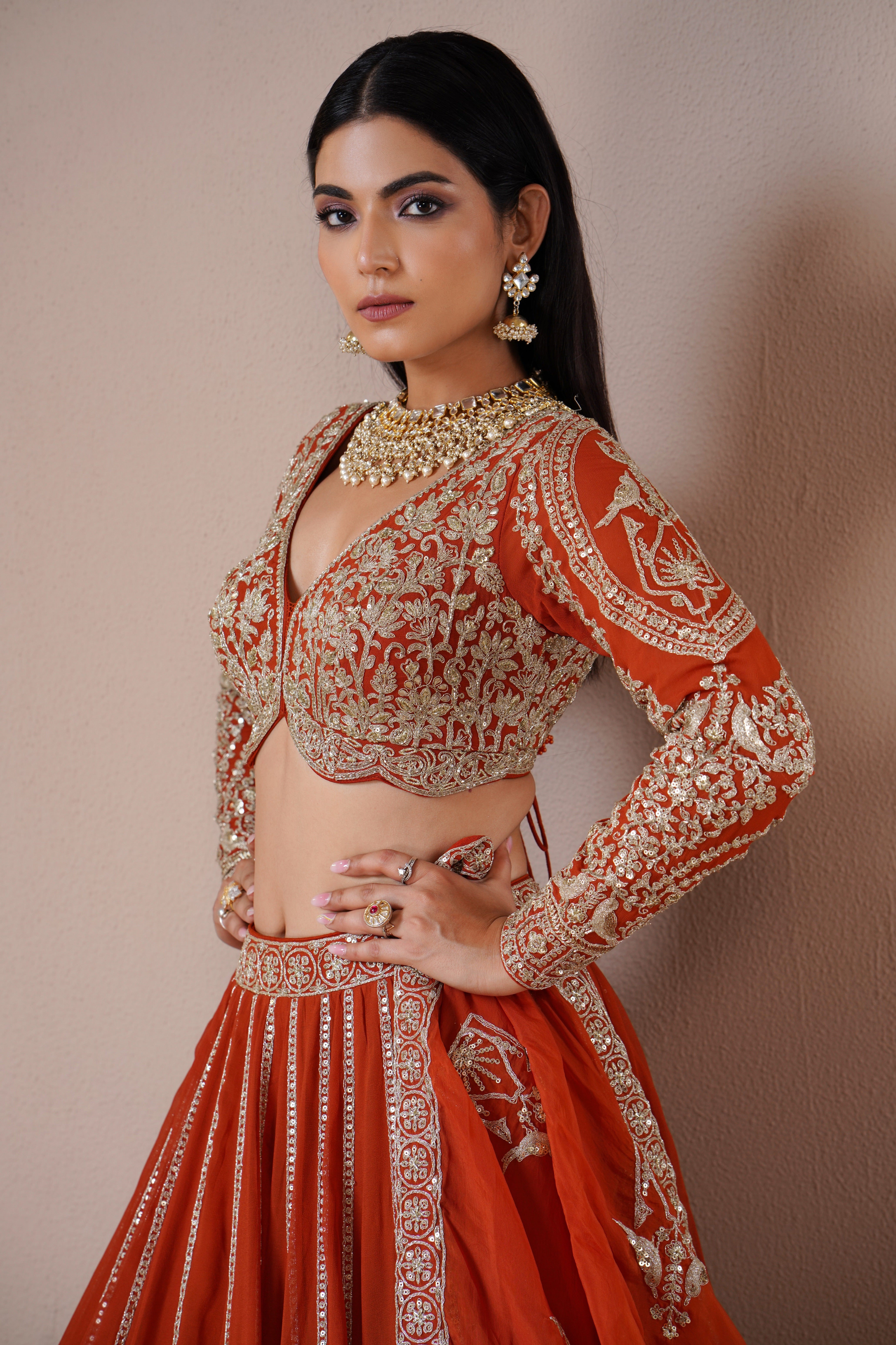Rust Orange Organza Lehenga with Intricate Zardosi Embroidery Mokshaa