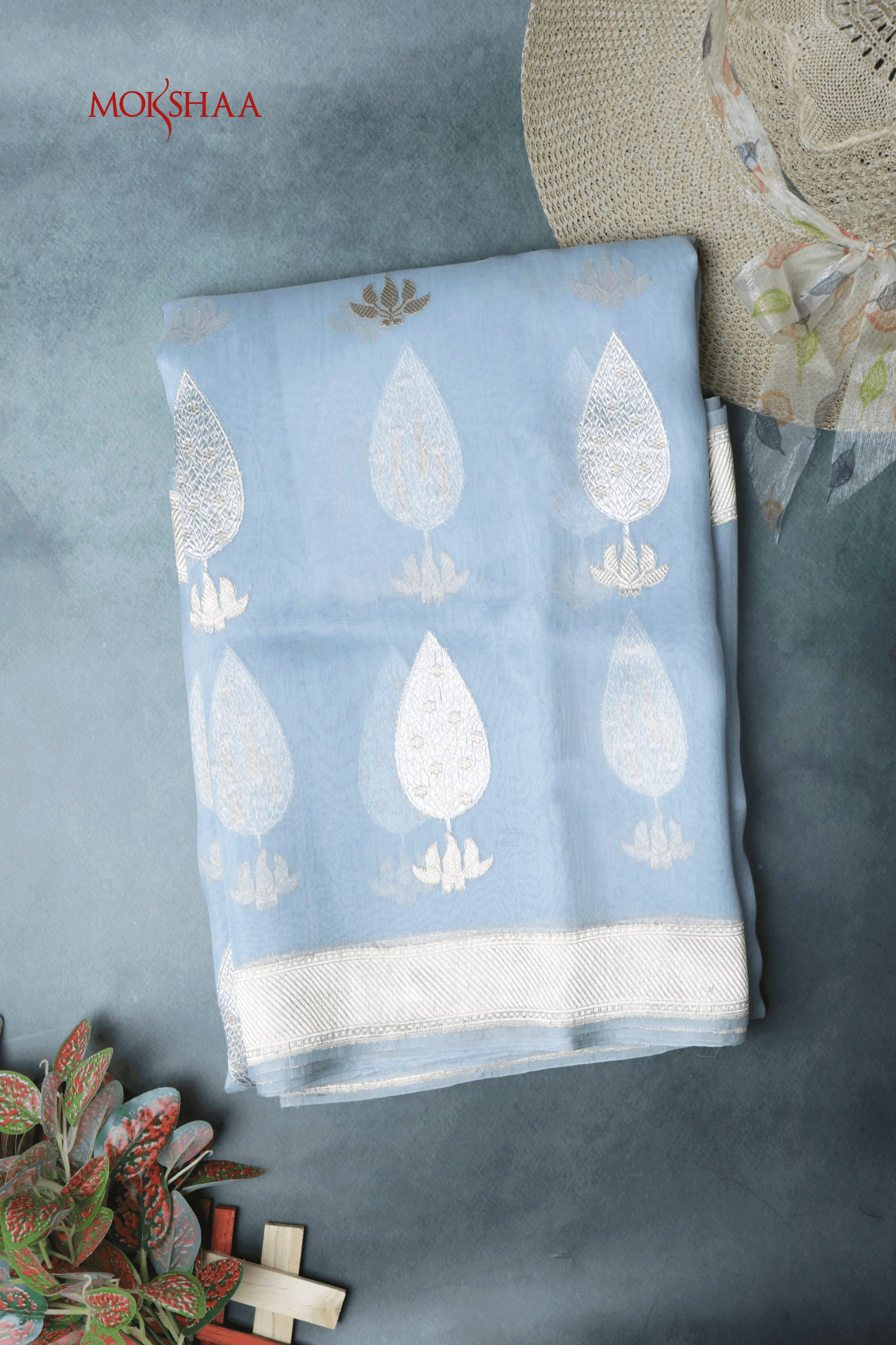 Sky Blue Tissue Organza Saree with Silver Motifs  Mokshaa