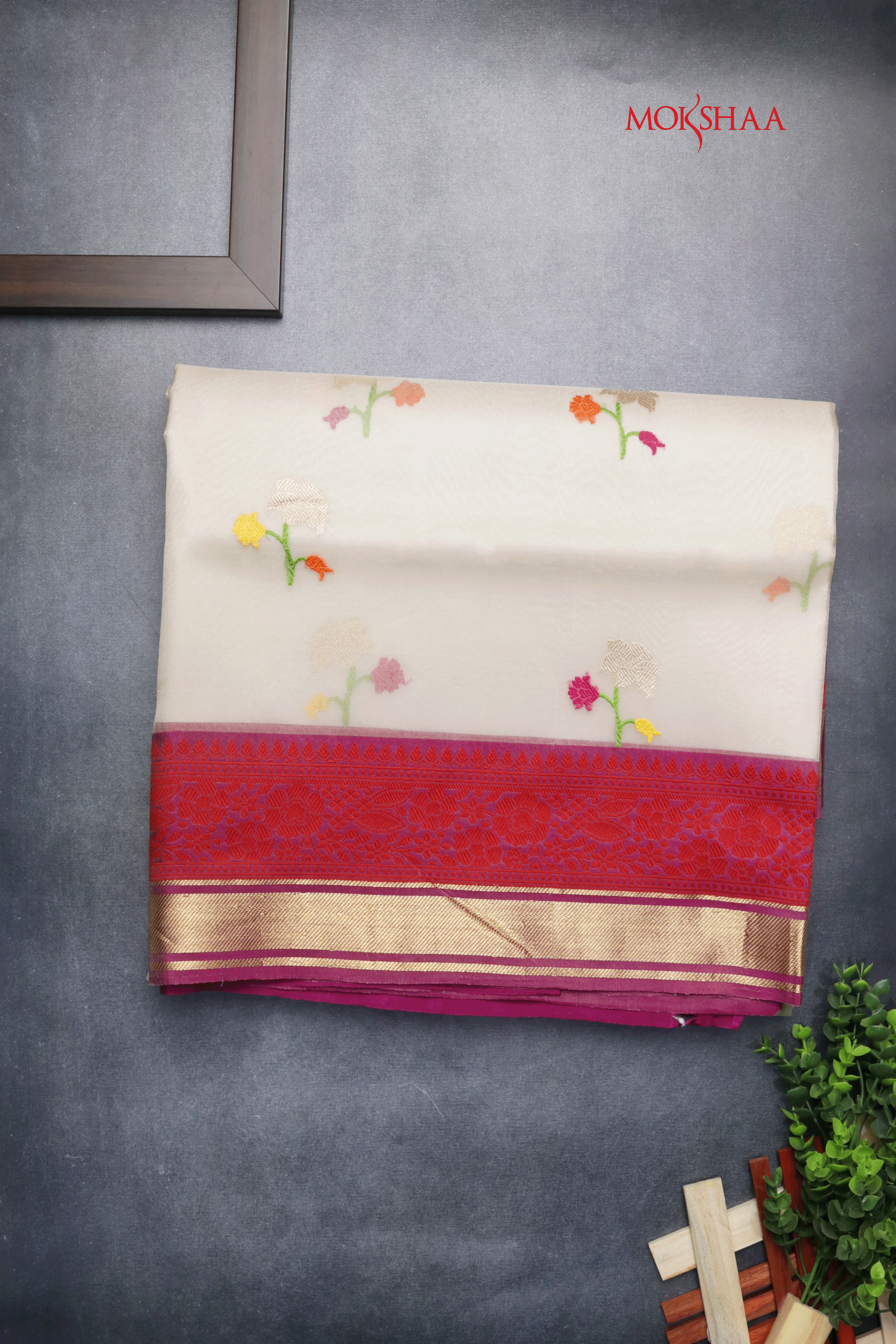 White Banarasi Kora Silk Saree with Floral Motifs and Contrast Red Border Mokshaa
