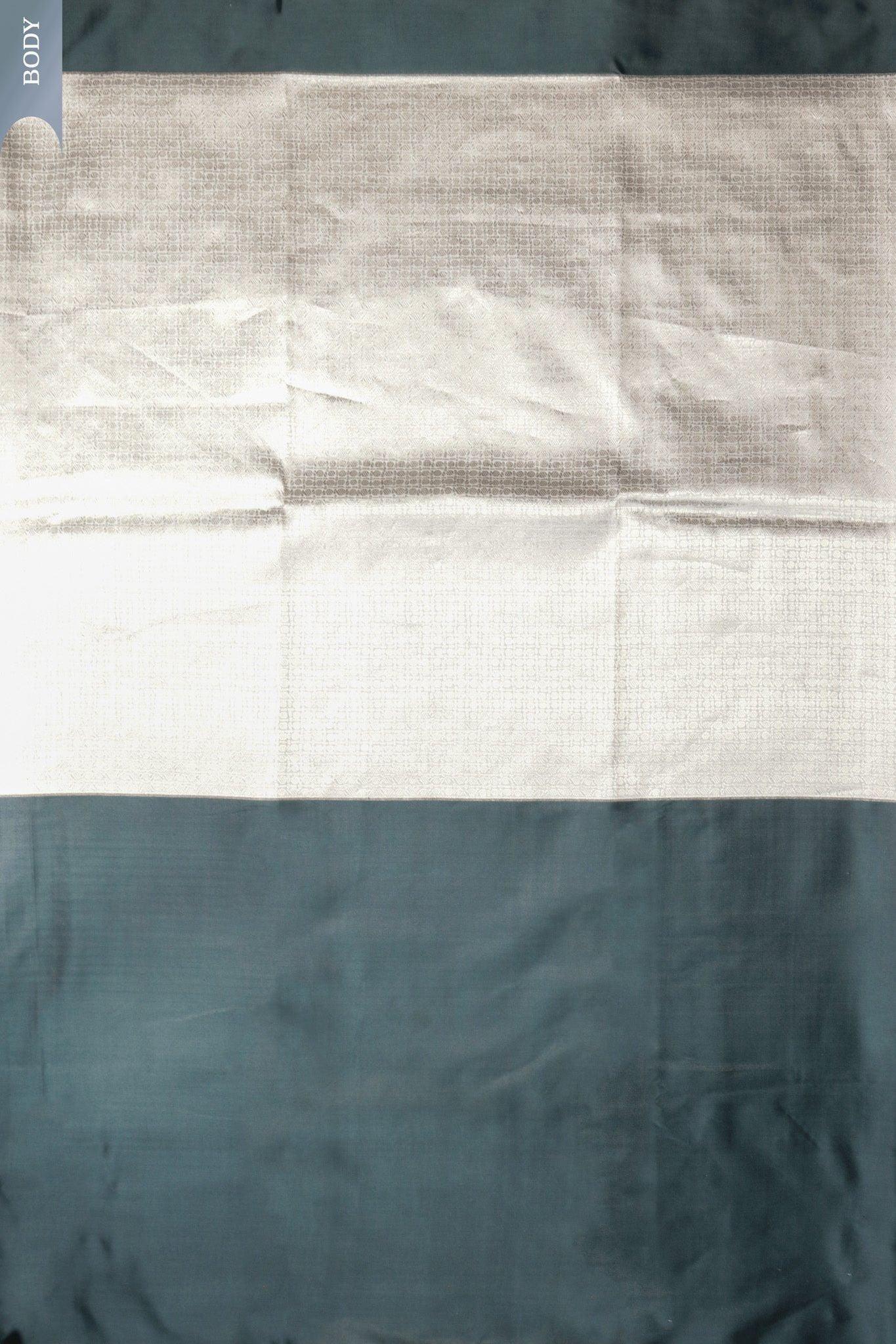 Teal Banarasi Silk Saree with Silver Zari Brocade Border Mokshaa