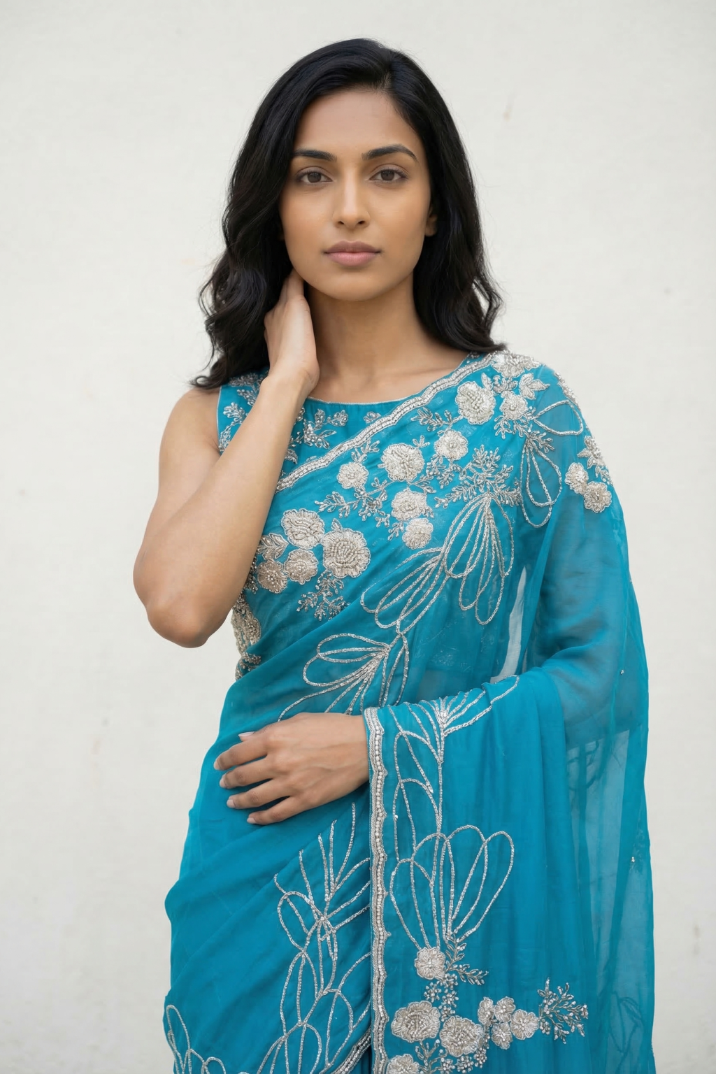 Turquoise Blue Silk Georgette Saree with Sequin & Bead Embroidery and Designer Blouse