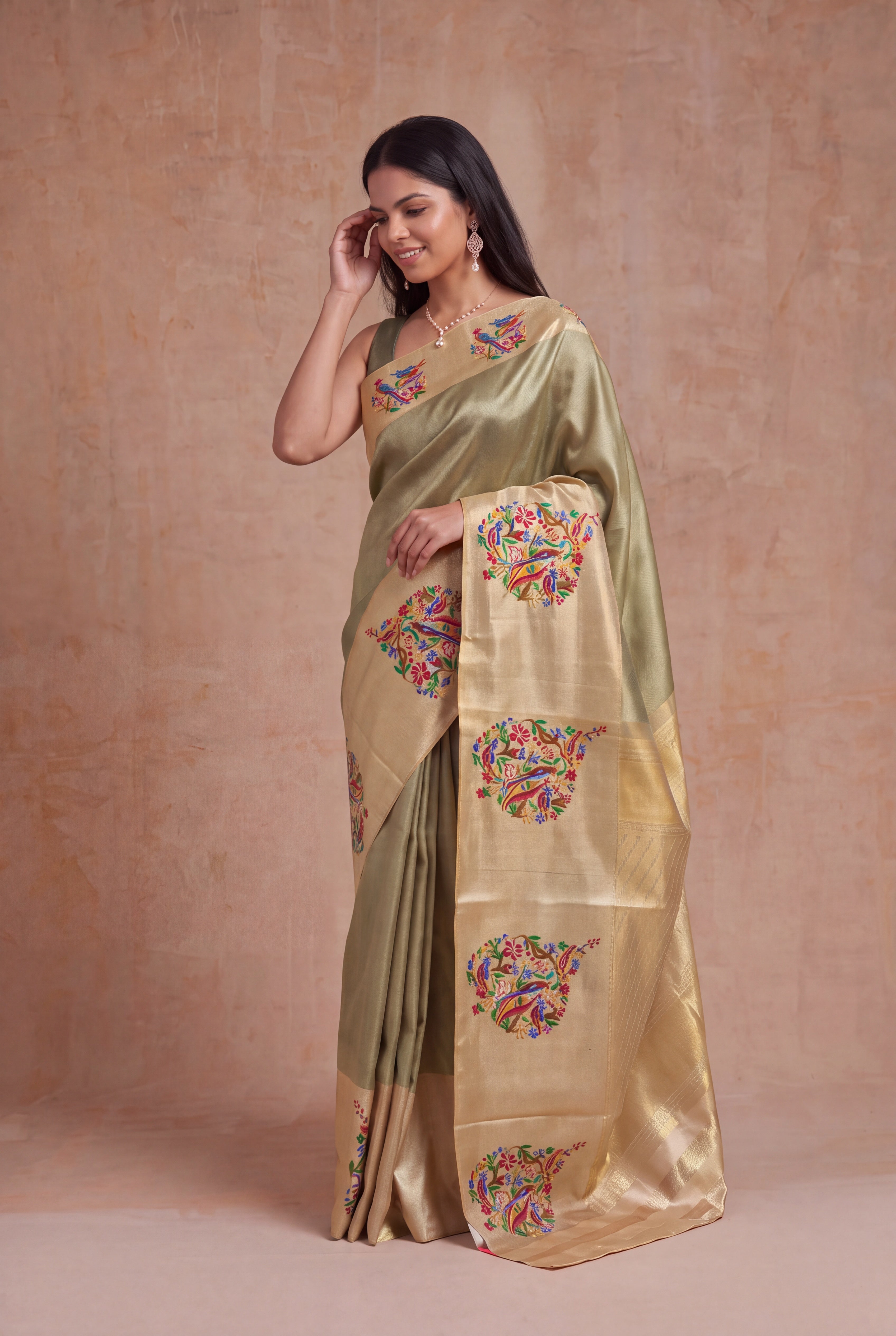 Pista Tissue Kanchivaram Silk Saree with Multicolour Motifs