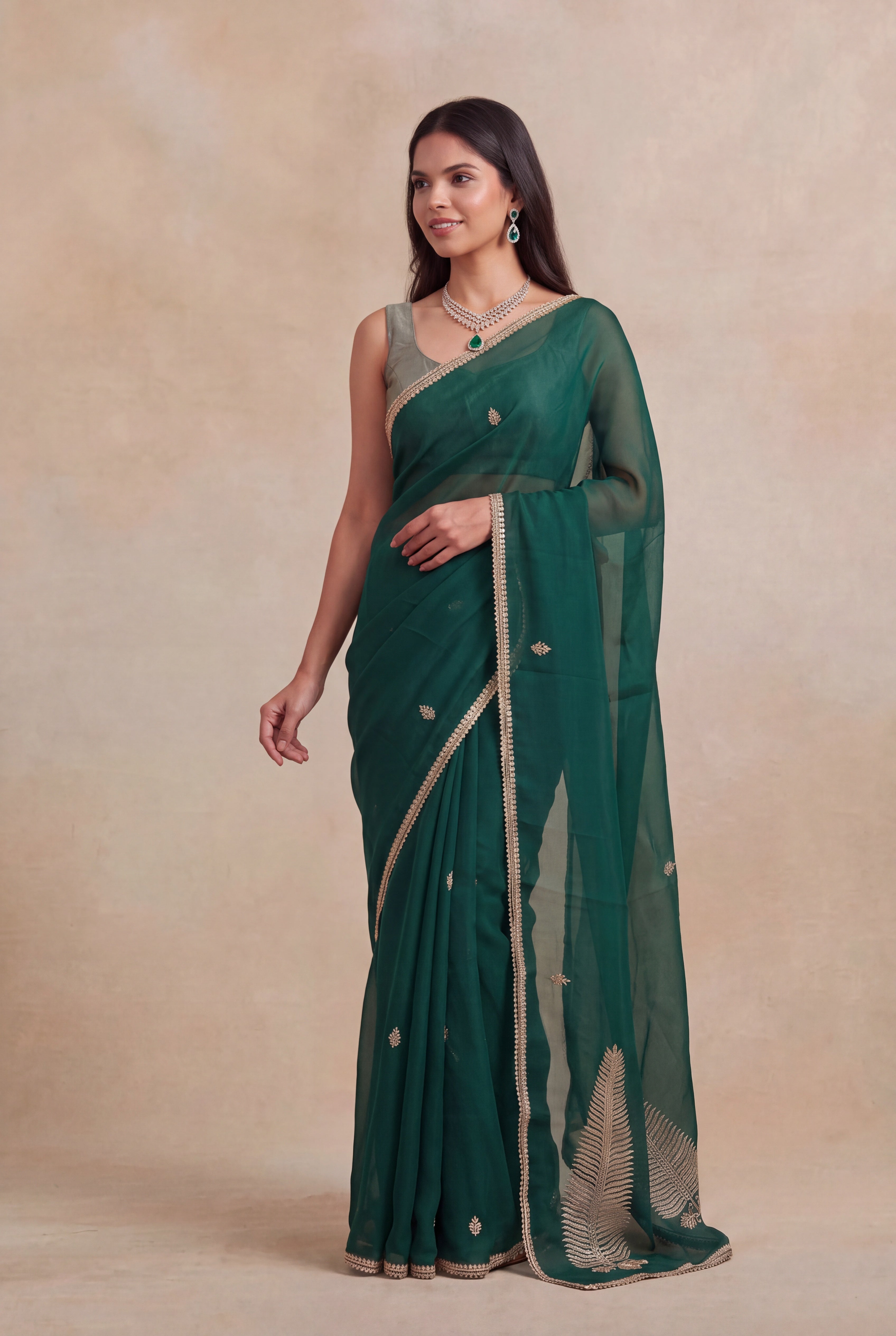 Emerald Green Organza Saree with Gold Sequin Work